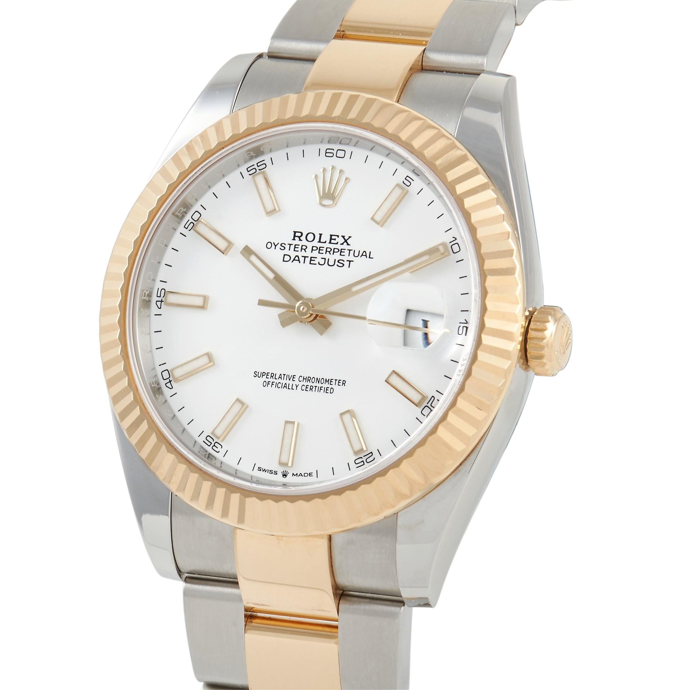 The Rolex Oyster Perpetual Datejust Watch, reference number 126333, possesses a crisp sense of sophistication. 

A Stainless Steel case measuring 41mm is elegantly accented by this watch’s fluted bezel, which is crafted from 18K Yellow Gold. On the