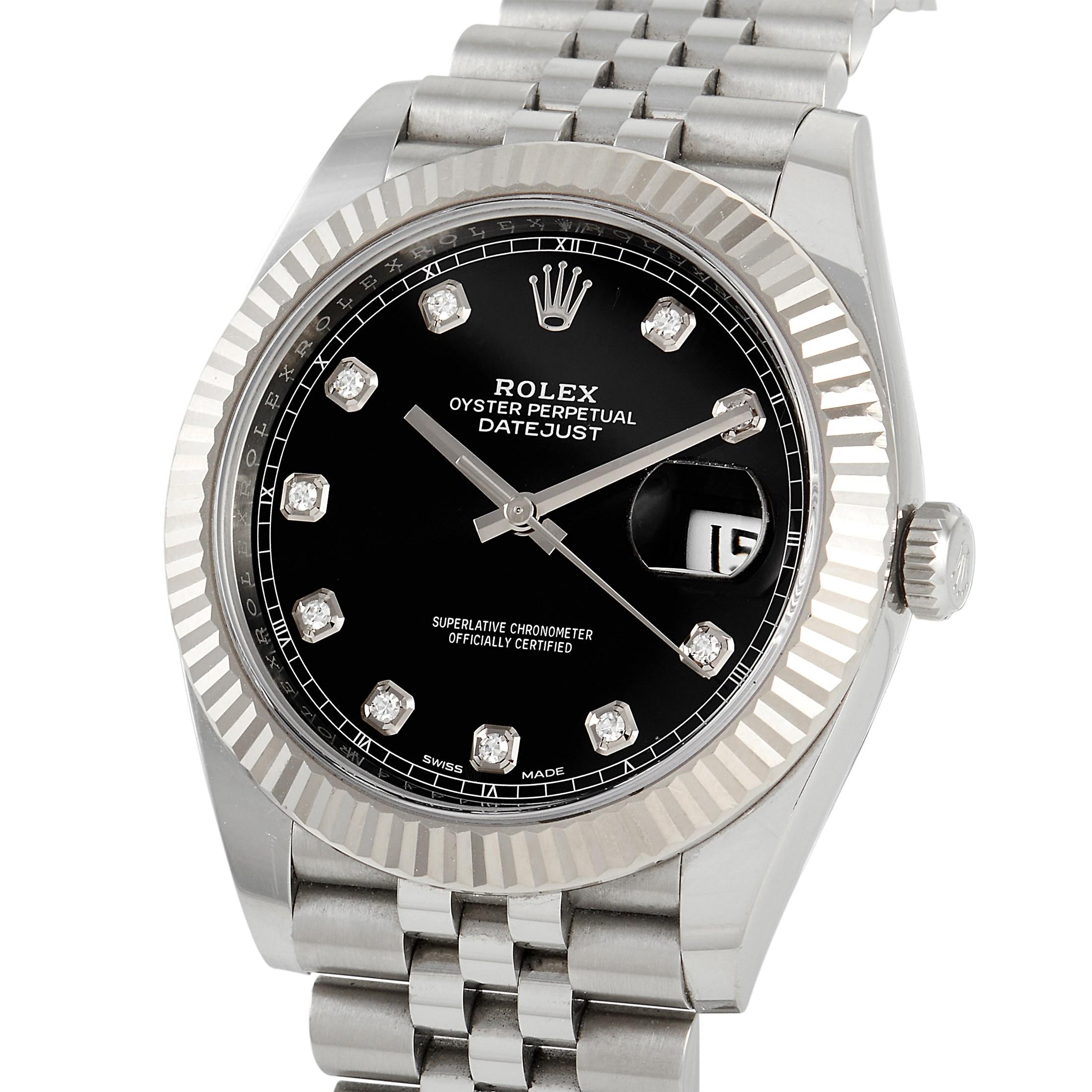 The Rolex Datejust Watch, reference number 126334-0012, possesses a crisp, classic sense of style. 

This timepiece features a 41mm case made from 18K white gold that is accented by a fluted bezel. On the striking black dial, you’ll find silver