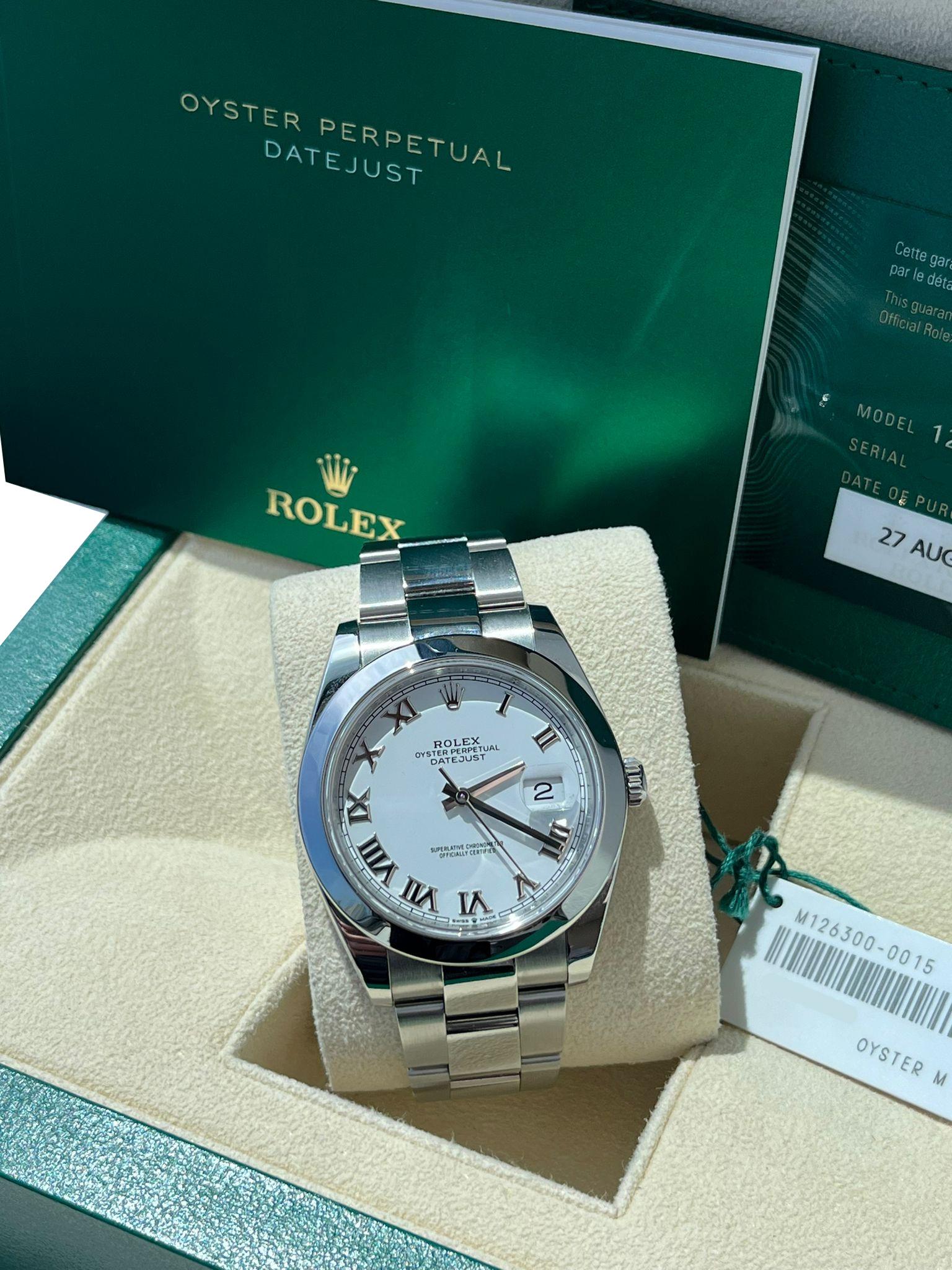 Rolex Datejust 41mm White Roman Dial Smooth Oyster Bezel Bracelet Watch 126300 In New Condition For Sale In Aventura, FL