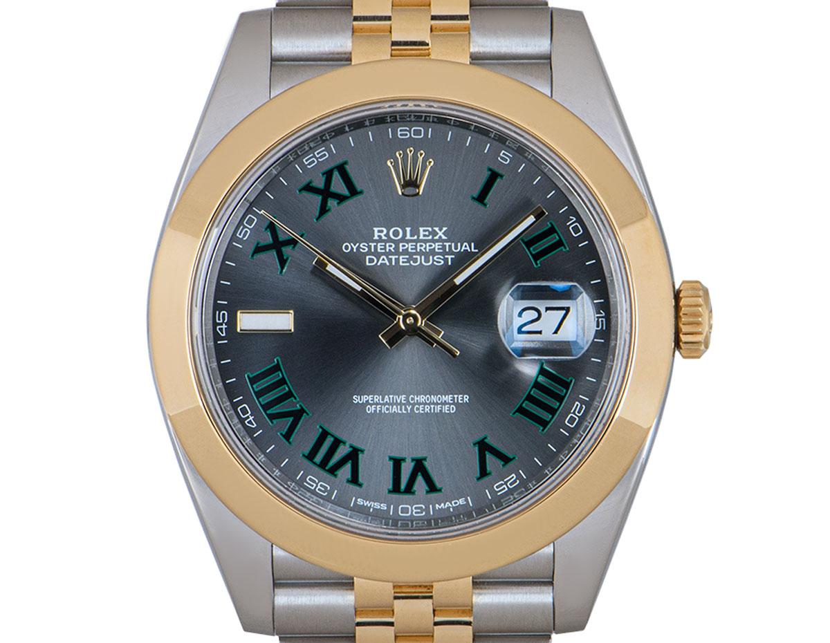 A 41mm Datejust by Rolex in Oystersteel and yellow gold. Features the sought-after Wimbledon dial with a smooth yellow gold bezel. The Jubilee bracelet comes with an Oyster folding clasp, featuring the comfort extension link. Fitted with a sapphire