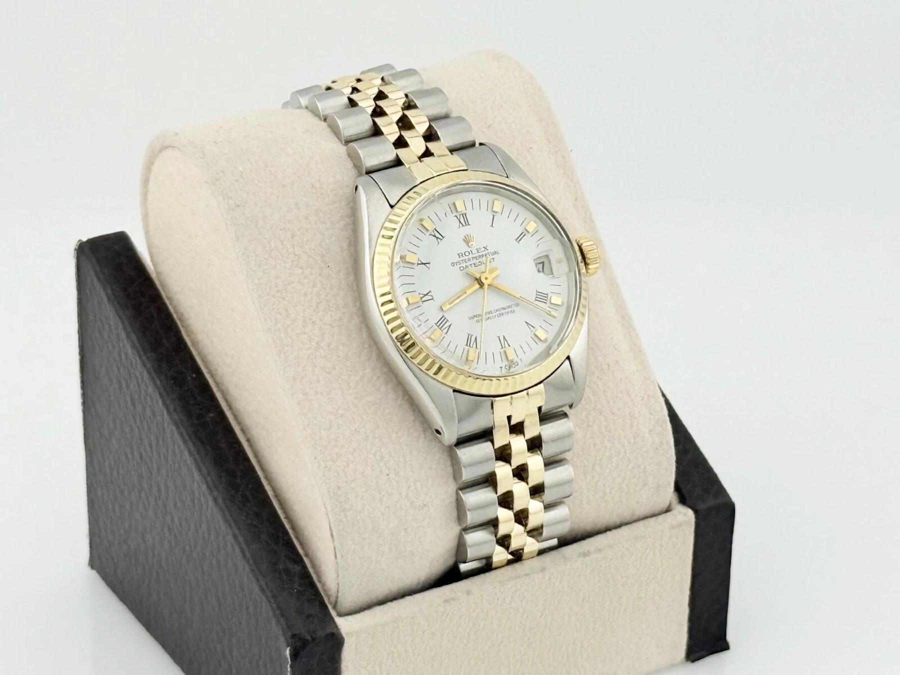 Style Number: 6824
Serial: 558****
Year: 1978
Model: Rolex Datejust
Case Material: Stainless Steel
Band: 14k Yellow Gold & Stainless Steel Jubilee
Bezel: 14k Yellow Gold Fluted Bezel
Dial: White Roman
Face: Acrylic
Case Size: 31mm

Includes: