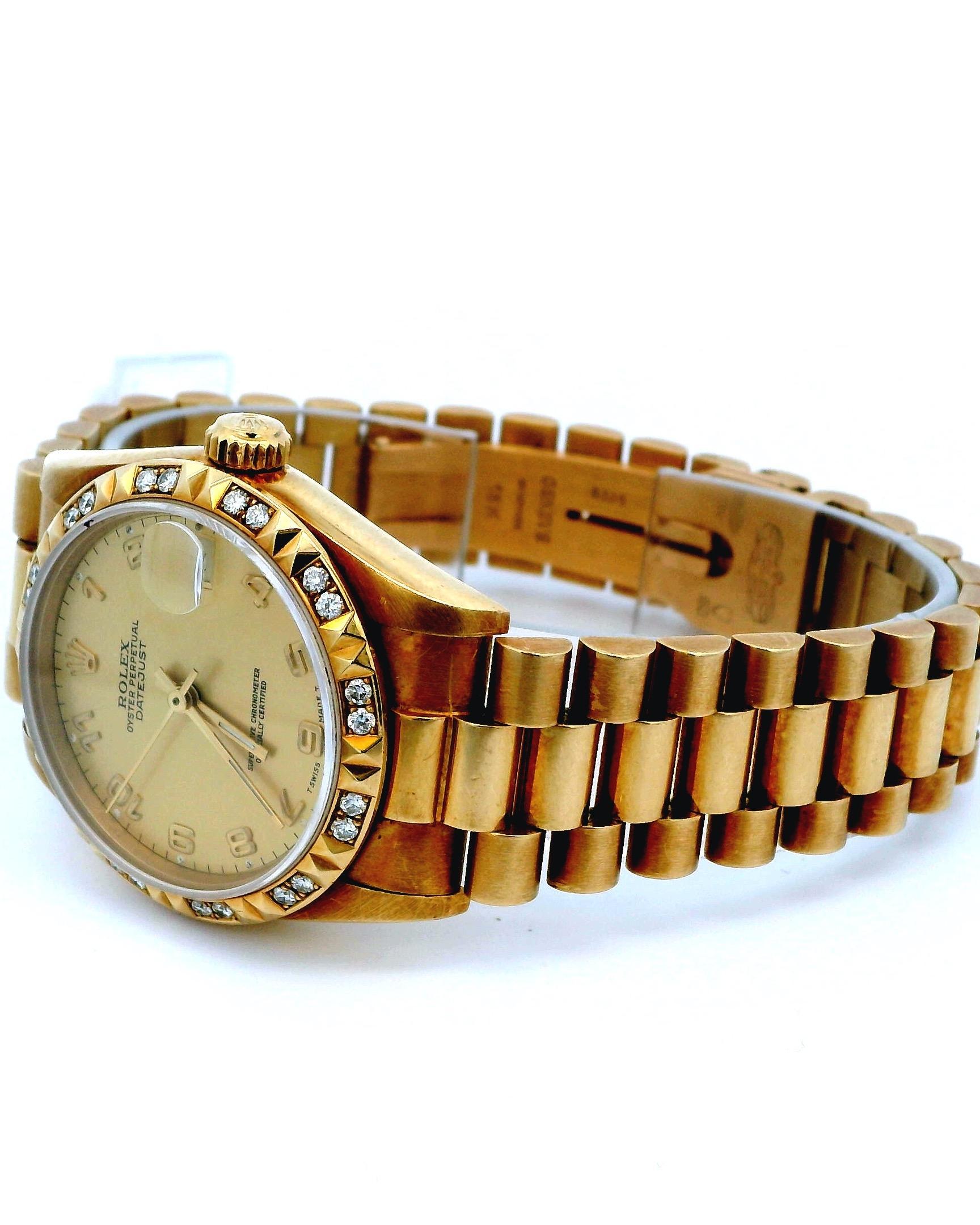 Rolex Oyster Perpetual Datejust 68258 18K Midsize Ladies Watch. 31mm 18k yellow gold case. Pyramid bezel with factory placed diamonds. Champagne dial with gold hands and Arabic numeral hour markers. Quickset date display at the 3 o'clock position.