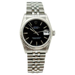 Rolex Datejust 68274 Midsize 31mm Quadrante nero Acciaio inossidabile Lunetta oro 18K