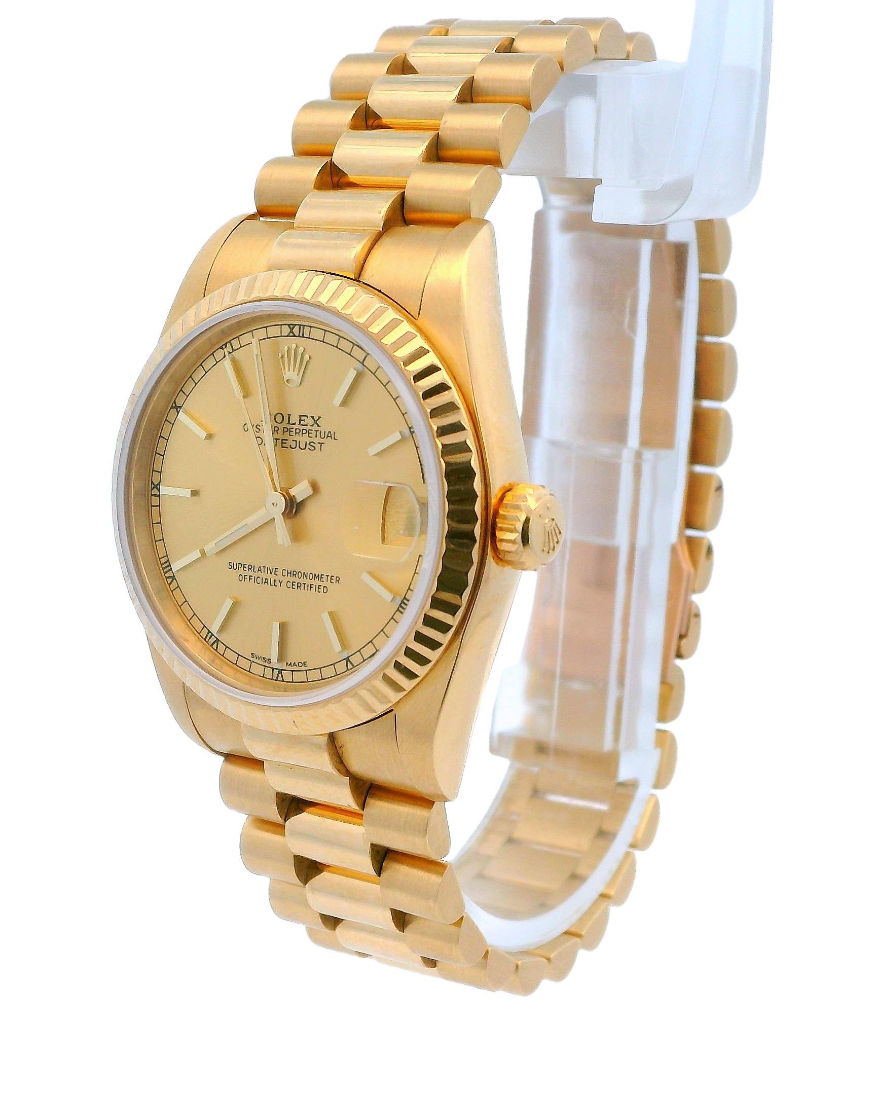 Rolex Oyster Perpetual Datejust Ladies' Watch 68278. This elegant timepiece features a 31mm 18k yellow gold case and an 18k yellow gold fluted bezel. The champagne dial is complemented by gold hands and index hour markers, and includes a date