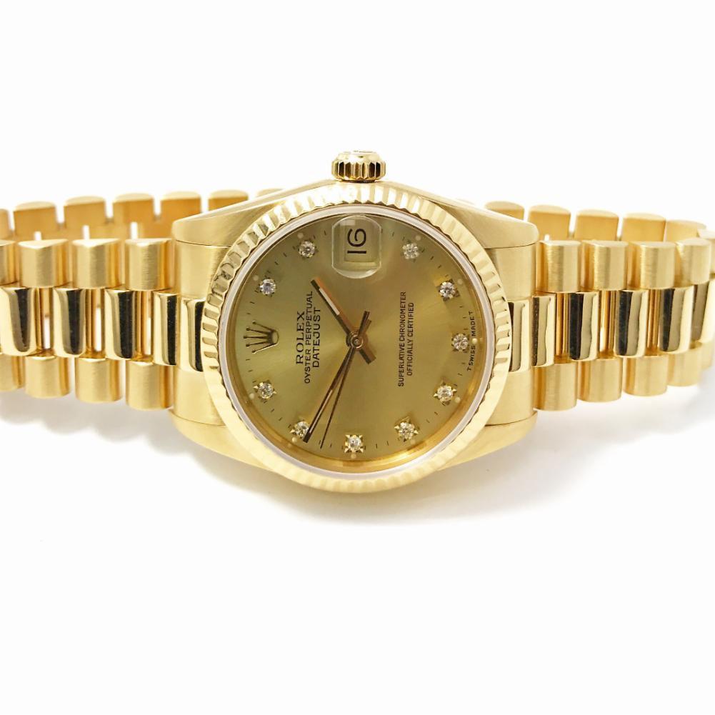 Rolex Datejust Reference #:68278. Womens 68278 Rolex Datejust  with a Yellow Champagne Diamond dial with an with a Yellow Gold presidential band.. Verified and Certified by WatchFacts. 1 year warranty offered by WatchFacts.
