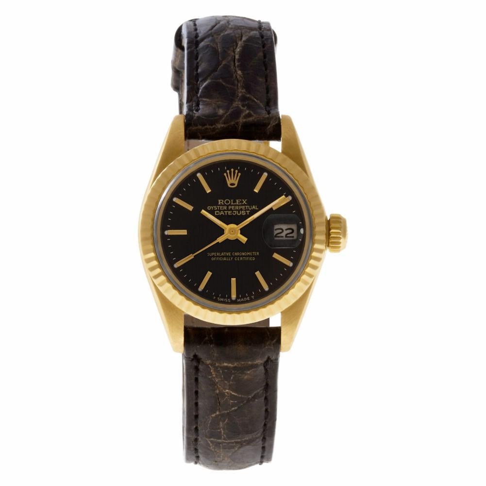 Rolex Datejust Reference #:6917. Rolex Datejust in 18k yellow gold with a black tapestry stick dial on a black crocodile strap. Auto with sweep seconds and date. Ref 6917. Circa 1980. Fine Pre-owned Rolex Watch. Certified preowned Rolex Datejust