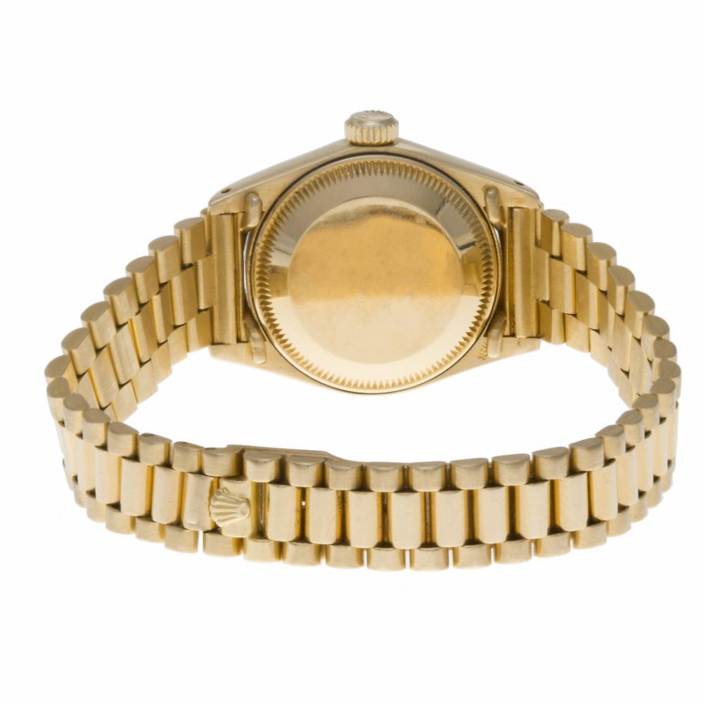 gold rolex blue face