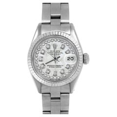 Rolex, bracelet Oyster Datejust 6917 en nacre blanche avec cadran en diamants et corde