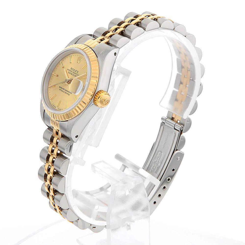 This exquisite Rolex Datejust 69173 is a true embodiment of timeless elegance and sophistication, perfect for the discerning woman who appreciates classic style. The watch is a harmonious blend of stainless steel and yellow gold, creating a look