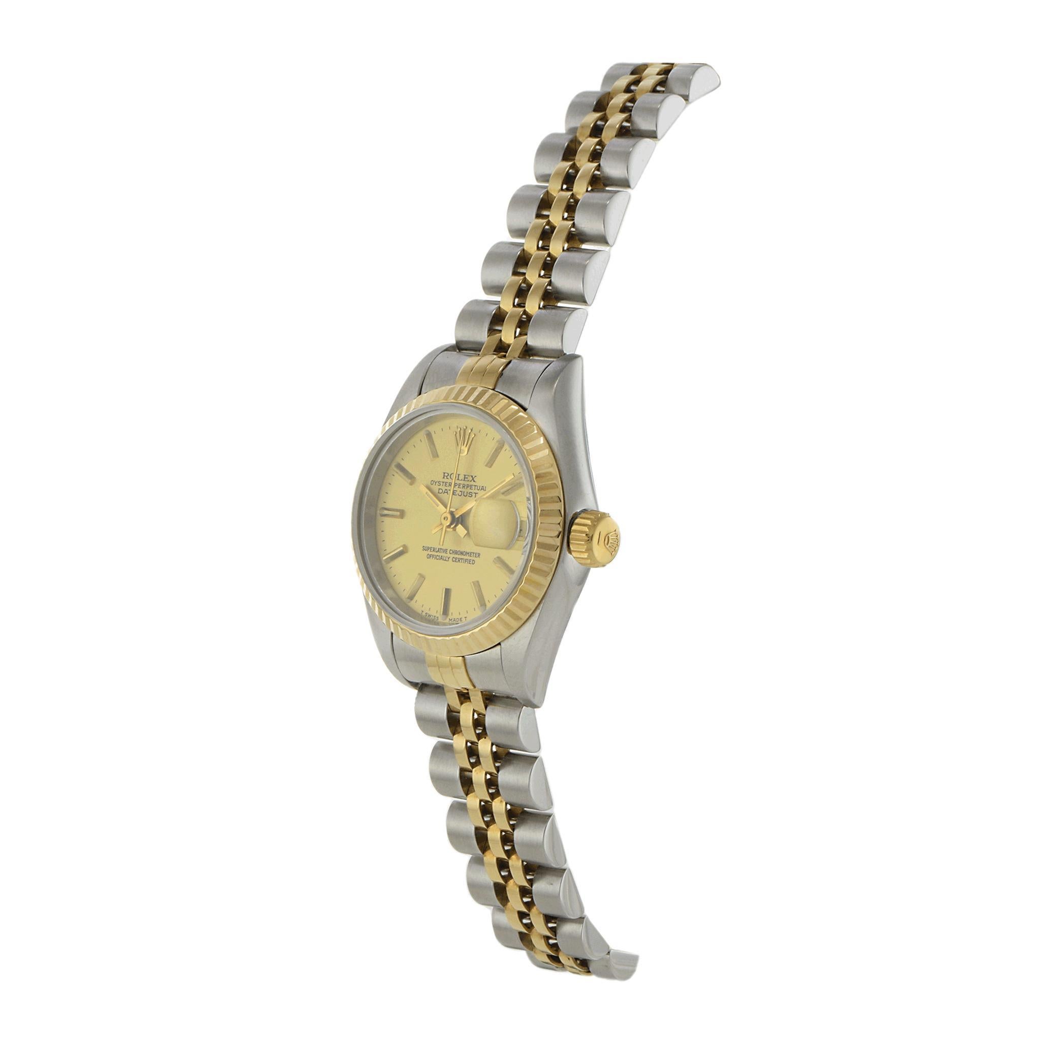A timeless 1994 Rolex Datejust 26MM, featuring a stainless steel and 18K yellow gold case, paired with the classic Jubilee bracelet for a refined and sophisticated look. The champagne dial is elegantly accented with gold stick markers, maintaining