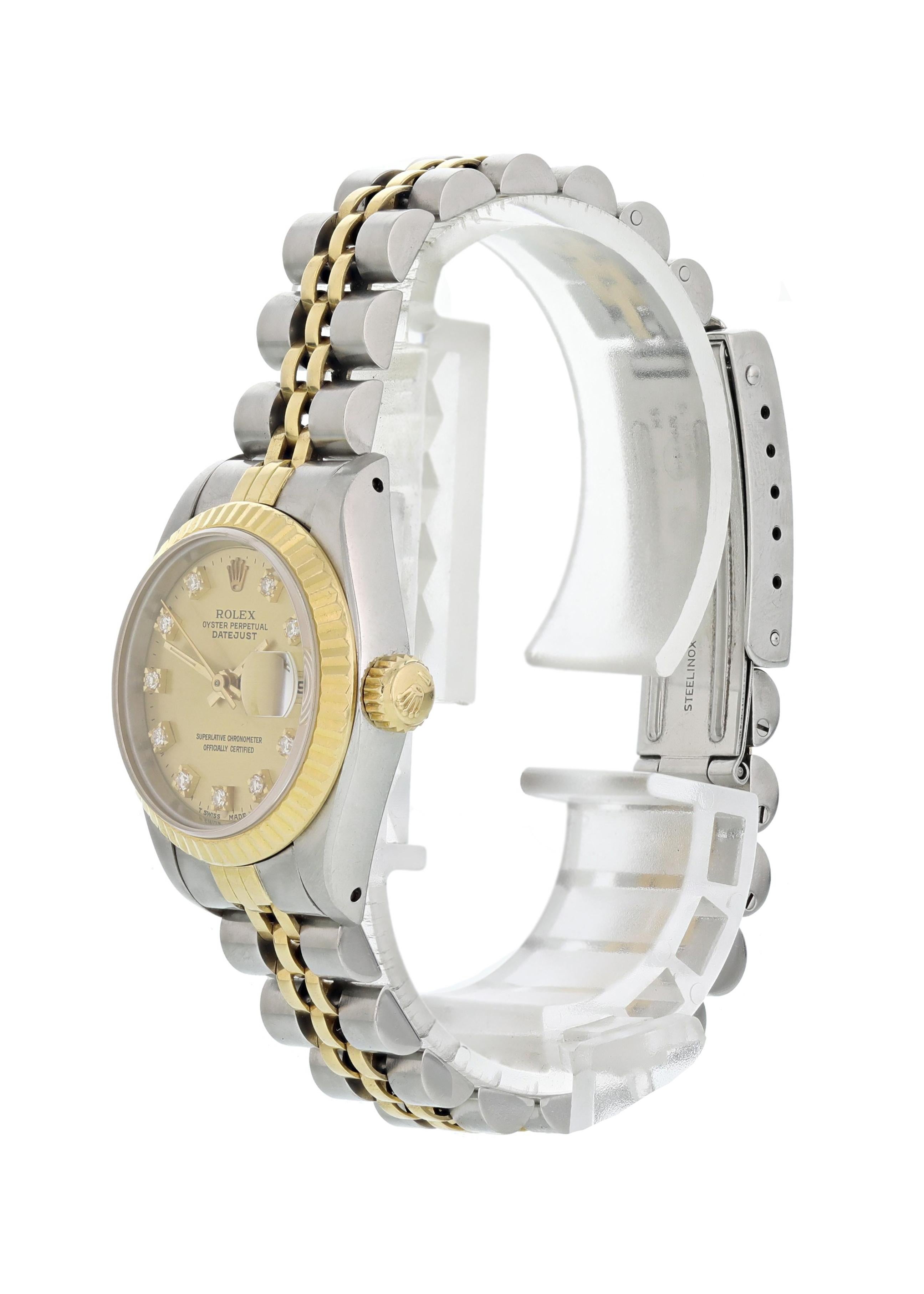 Rolex Datejust Professional 69173 Ladies Watch. 
26mm Stainless Steel case. 
Yellow Gold Stationary bezel. 
Champagne dial with Luminous gold hands and Factory placed diamond hour markers. 
Minute markers on the outer dial. 
Date display at the 3