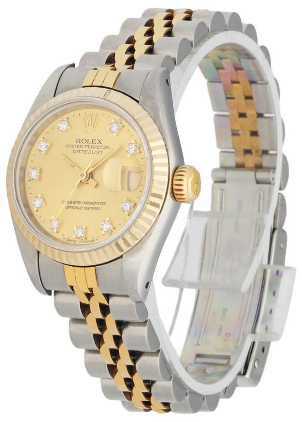 Rolex Oyster Perpetual Datejust 69173 Ladies watch. 26mm stainless steel case. 18k yellow gold fluted bezel. Champagne dial with yellow gold hands and factory diamond hour markers. Magnified date display at 3 o'clock position. 18k yellow gold and