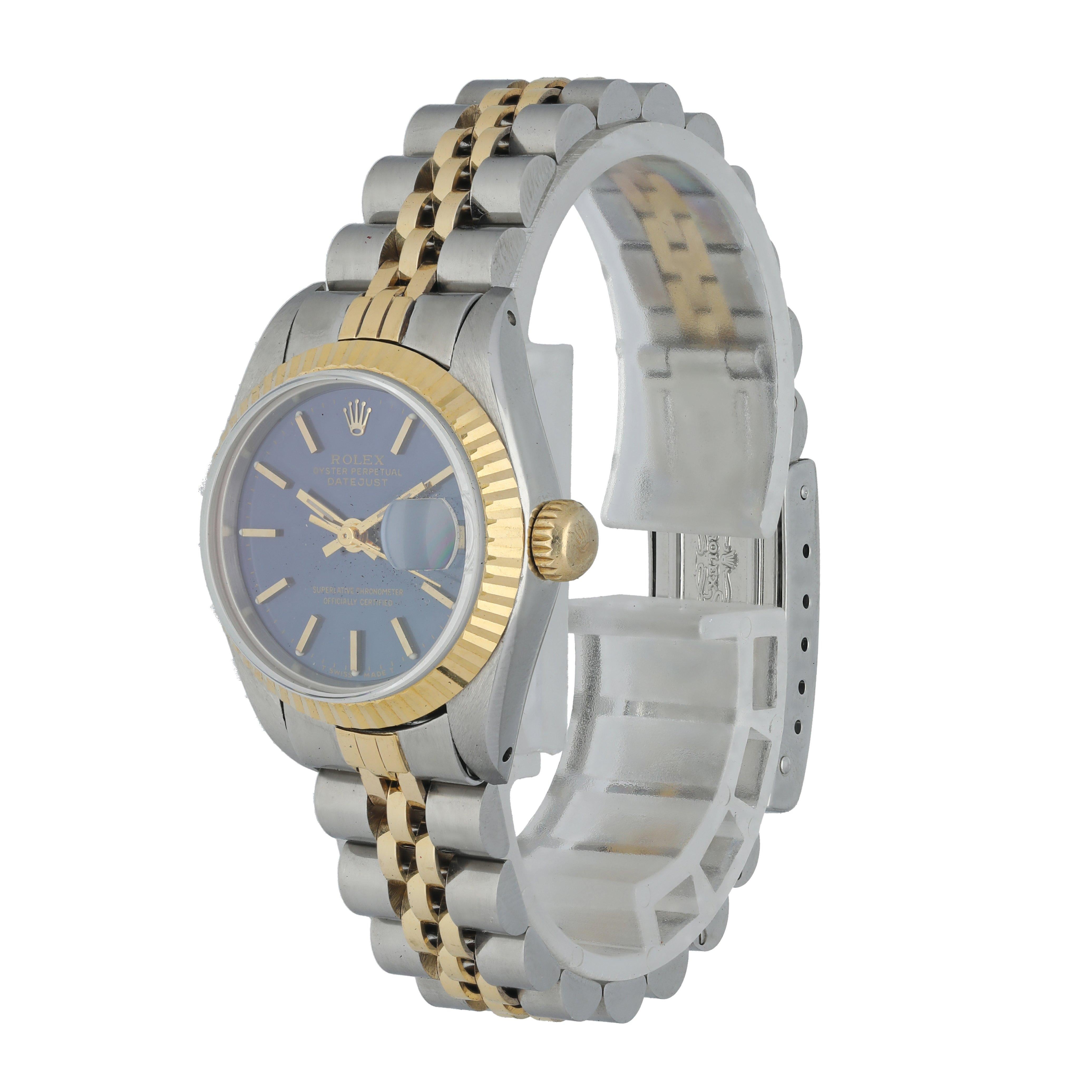 Rolex Datejust 69173 Ladies Watch.
26mm Stainless Steel case. 
Yellow Gold fluted bezel. 
Blue dial with luminous gold hands and index hour markers. 
Minute markers on the outer dial. 
Date display at the 3 o'clock position. 
Two-tone stainless