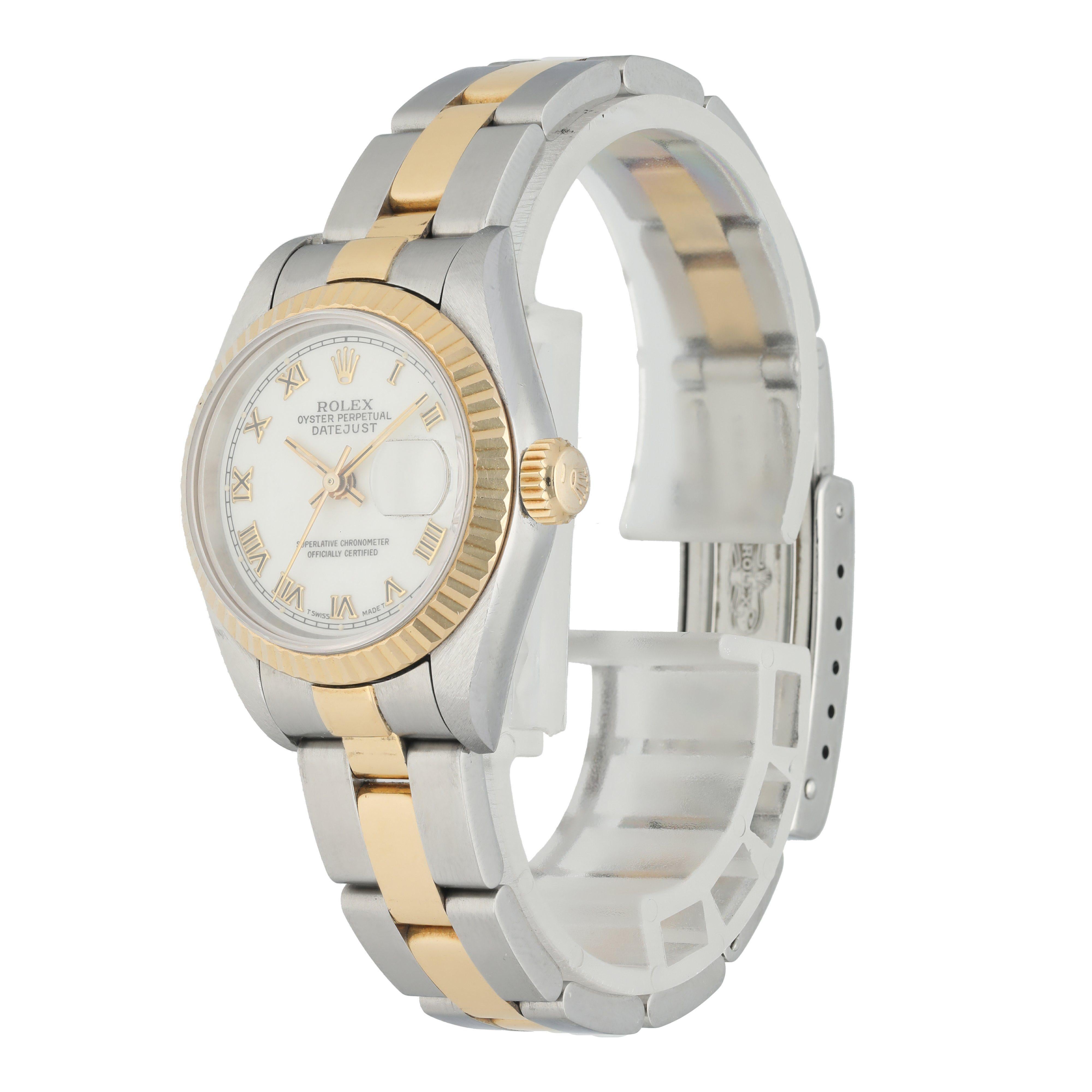 Rolex Datejust 69173 Ladies Watch. 
26mm Stainless Steel case. 
Yellow Gold fluted bezel. 
White dial with luminous gold hands and Roman numeral hour markers. 
Minute markers on the outer dial. 
Date display at the 3 o'clock position. 
Stainless