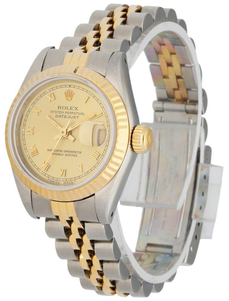 Rolex Datejust 69173 Ladies Watch. 26mm Stainless Steel case. 18K Yellow Gold fluted bezel. Champagne dial with Luminous gold hands and Roman numeral hour markers. Minute markers on the outer dial. Date display at the 3 o'clock position. Stainless