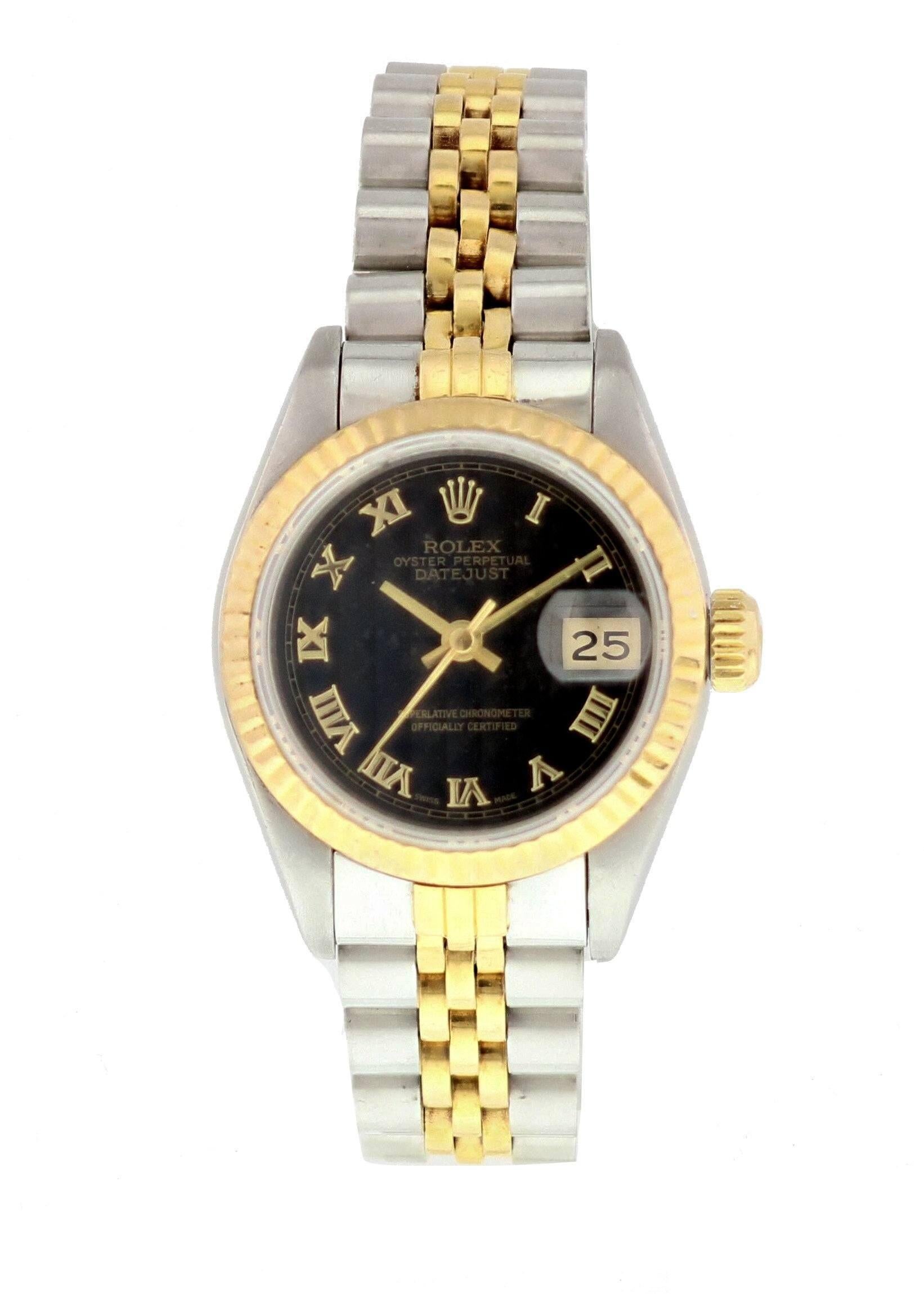 Rolex Oyster Perpetual Datejust Ladies Watch. 26 mm stainless steel case. 18k yellow gold fluted bezel. Black pyramid dial with yellow gold hands and Roman numeral hour markers. 18k yellow gold and stainless steel Jubilee band with a stainless steel