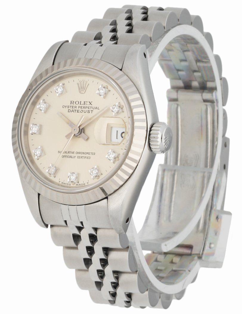 Rolex Datejust 69174 Ladies Watch. 26mm Stainless Steel Case with 18K White Gold fluted bezel. Silver dial with Luminous Steel hands and factory diamond hour markers. Minute markers on the outer dial. Date display at the 3 o'clock position.