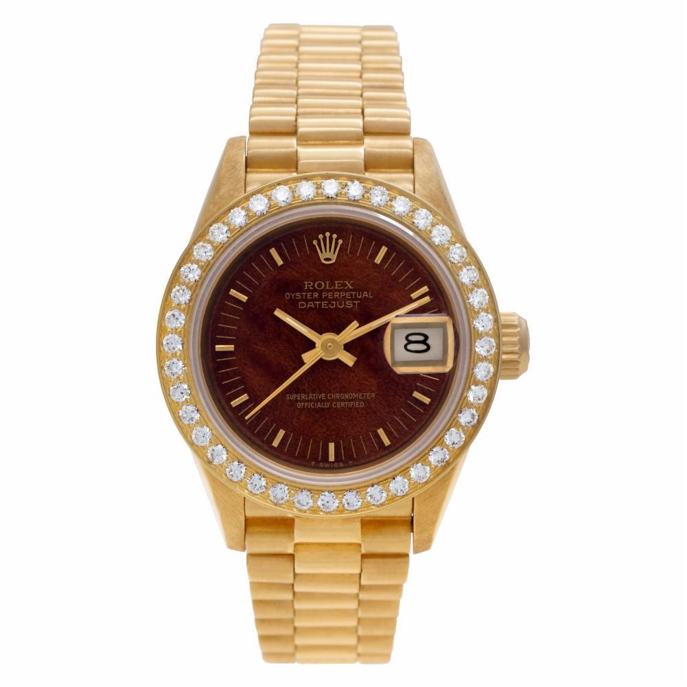 Rolex Datejust Reference #:69178. Ladies Rolex Datejust in 18k yellow gold with original Mahogany wood and custom diamond bezel on a President band. Auto w/ sweep seconds and date. Ref 69178. Circa 1989. Fine Pre-owned Rolex Watch. Certified