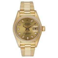 Rolex Datejust 69178 Or jaune 18K Diamant Cadran Champagne Montre Femme