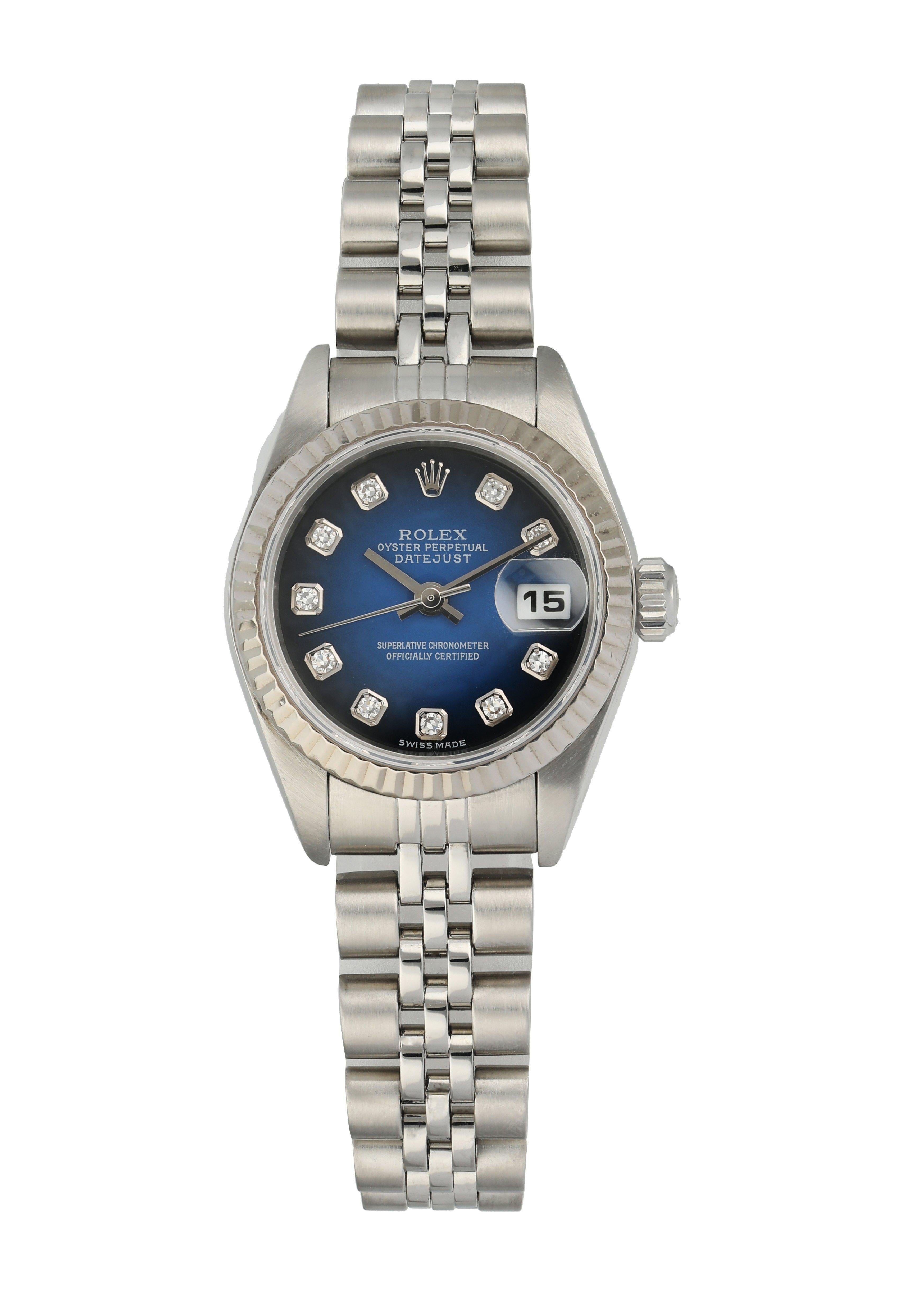 Rolex Datejust 79174 Blue Vignette Diamond Dial Ladies Watch.
26mm Stainless Steel case. 
Stainless Steel fluted bezel. 
Original Blue Vignette diamond dial.
Date display at the 3 o'clock position. 
Stainless Steel Jubilee Bracelet with Fold Over