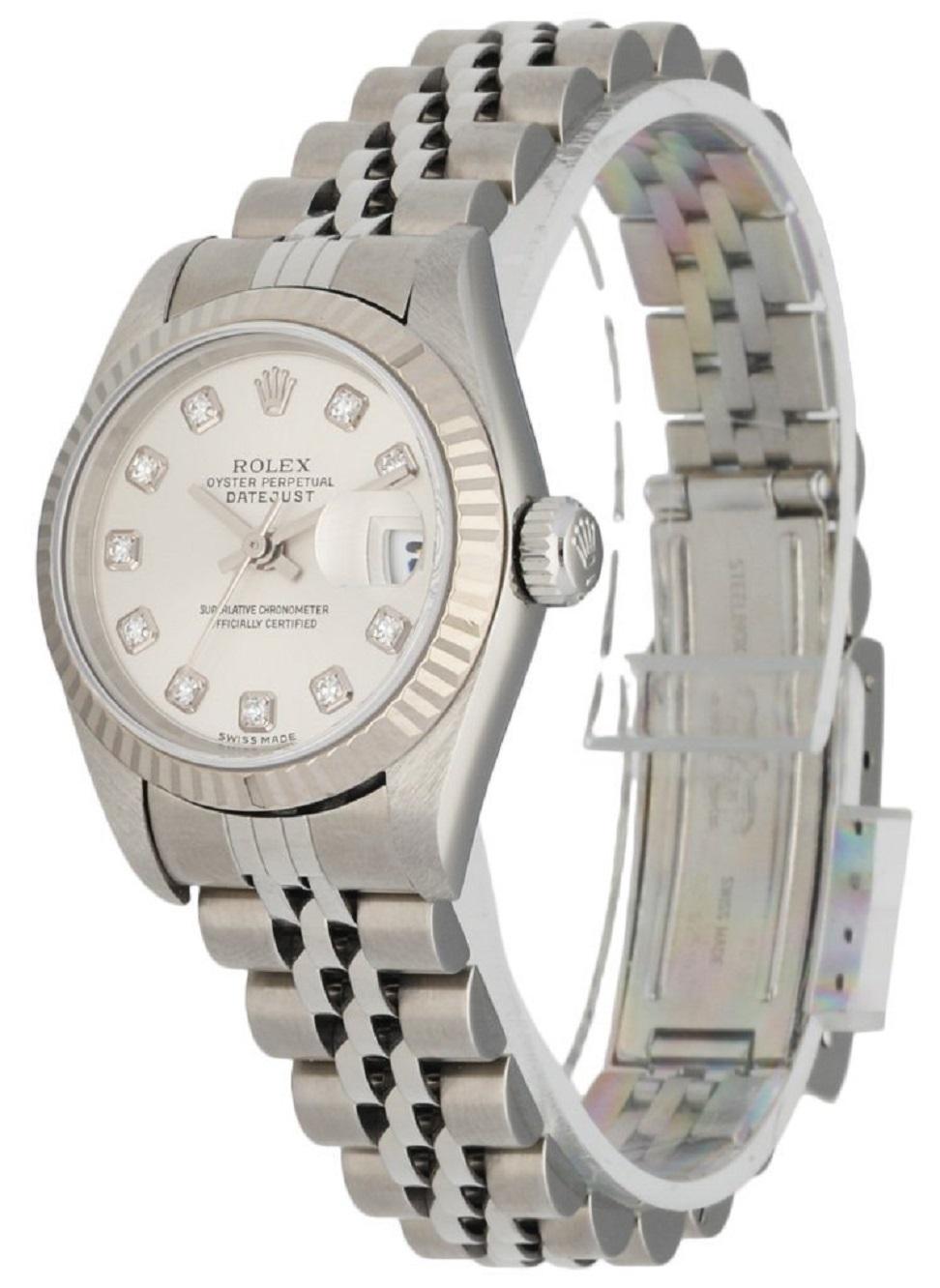 Rolex Oyster Perpetual Datejust 79174 Ladies Watch. 26mm stainless steel case. 18k white gold fluted bezel. Silver dial with steel hands and factory diamond hour markers. Date display at a 3 o'clock position. Stainless steel Jubilee bracelet; will