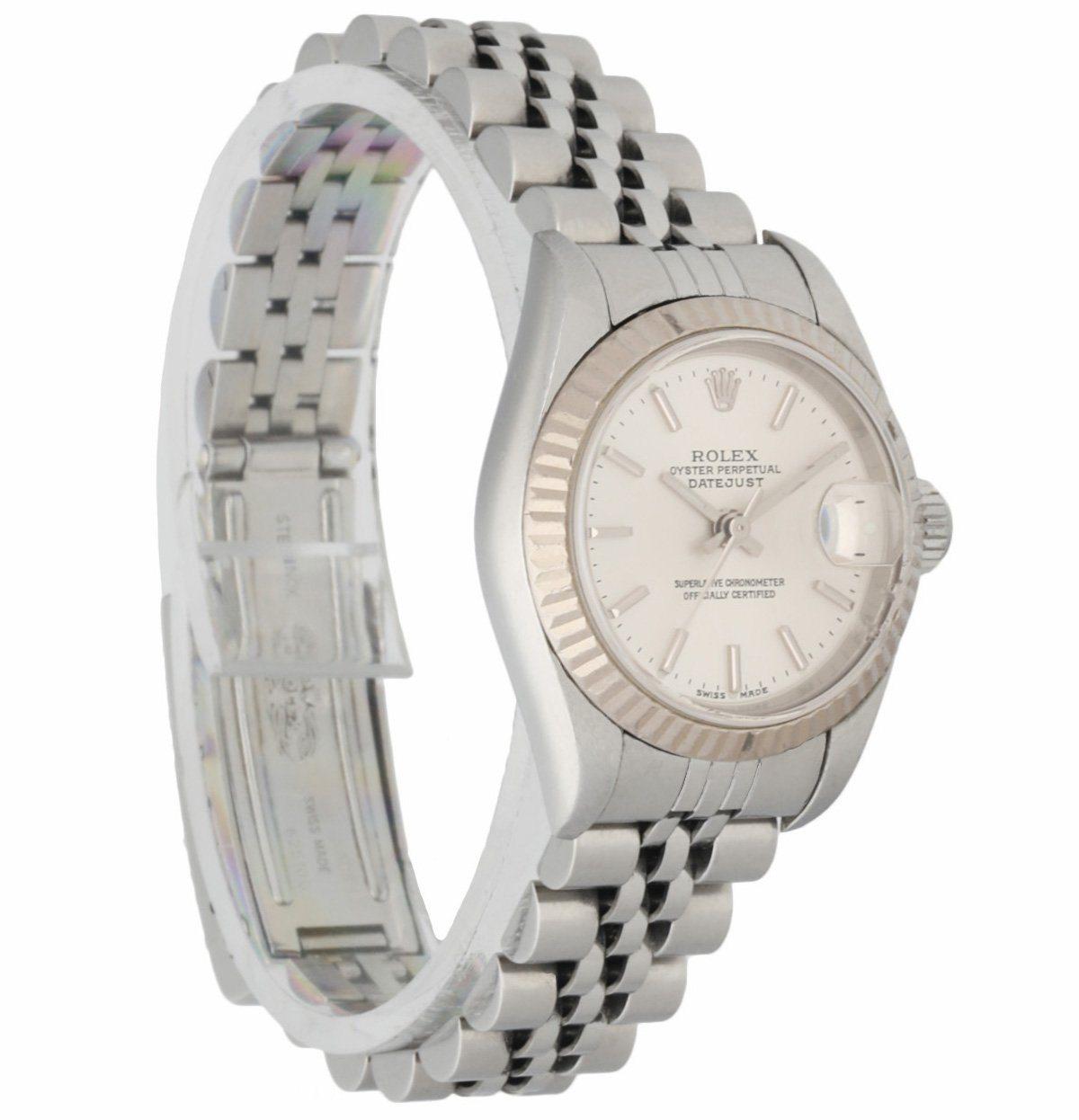 Rolex Oyster Perpetual Datejust 79174 Ladies Watch. 26mm stainless steel case. 18k white gold fluted bezel. Silver dial with luminous steel hands and index hour markers. Stainless steel Jubilee bracelet with fold over clasp. Will fit up to 6-inch