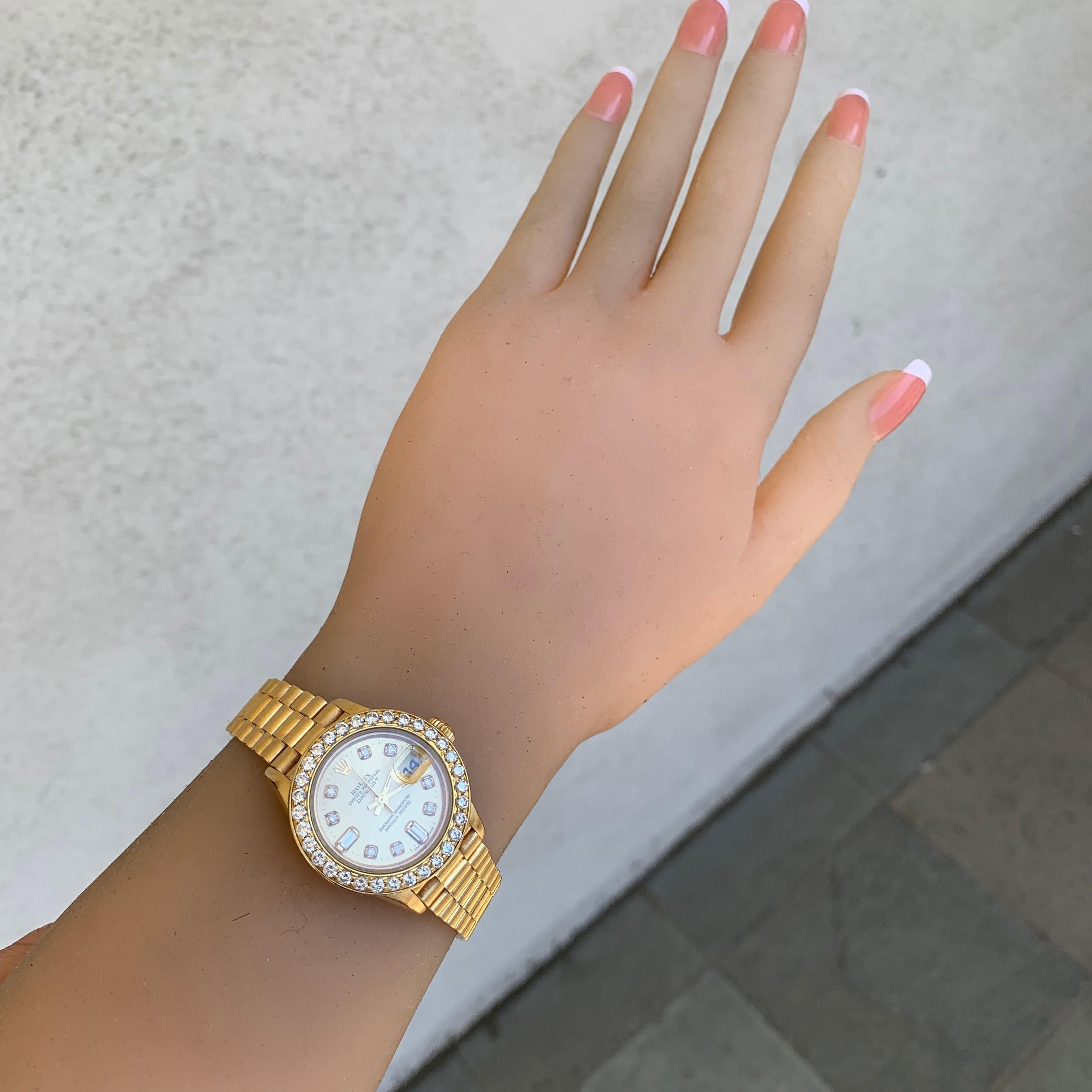Size: 26mm Case Diameter. 

Model=79178
Serial=A Serial ( Correlates to around Year 2000

Dial: Champagne With Diamond (Looks Original but not guaranteed)

Bezel: 1.50 Carat Total Weight Apprx, G-H VS-SI

It is in Very Good Condition as seen in the