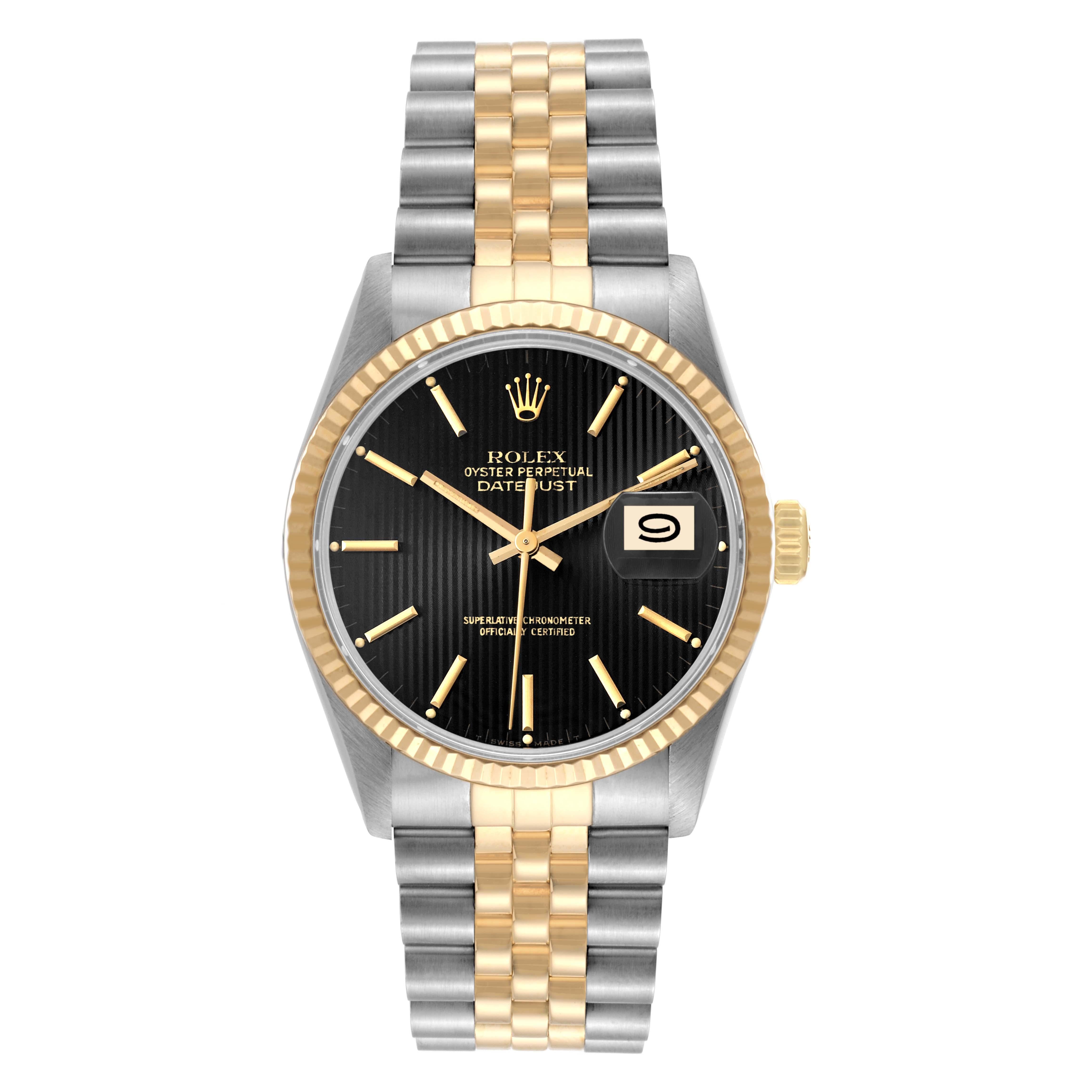 Rolex Datejust Black Tapestry Dial Steel Yellow Gold Vintage Mens Watch 16013. Officially certified chronometer automatic self-winding movement. Stainless steel and 18K yellow gold oyster case 36.0 mm in diameter. Rolex logo on an 18k yellow gold