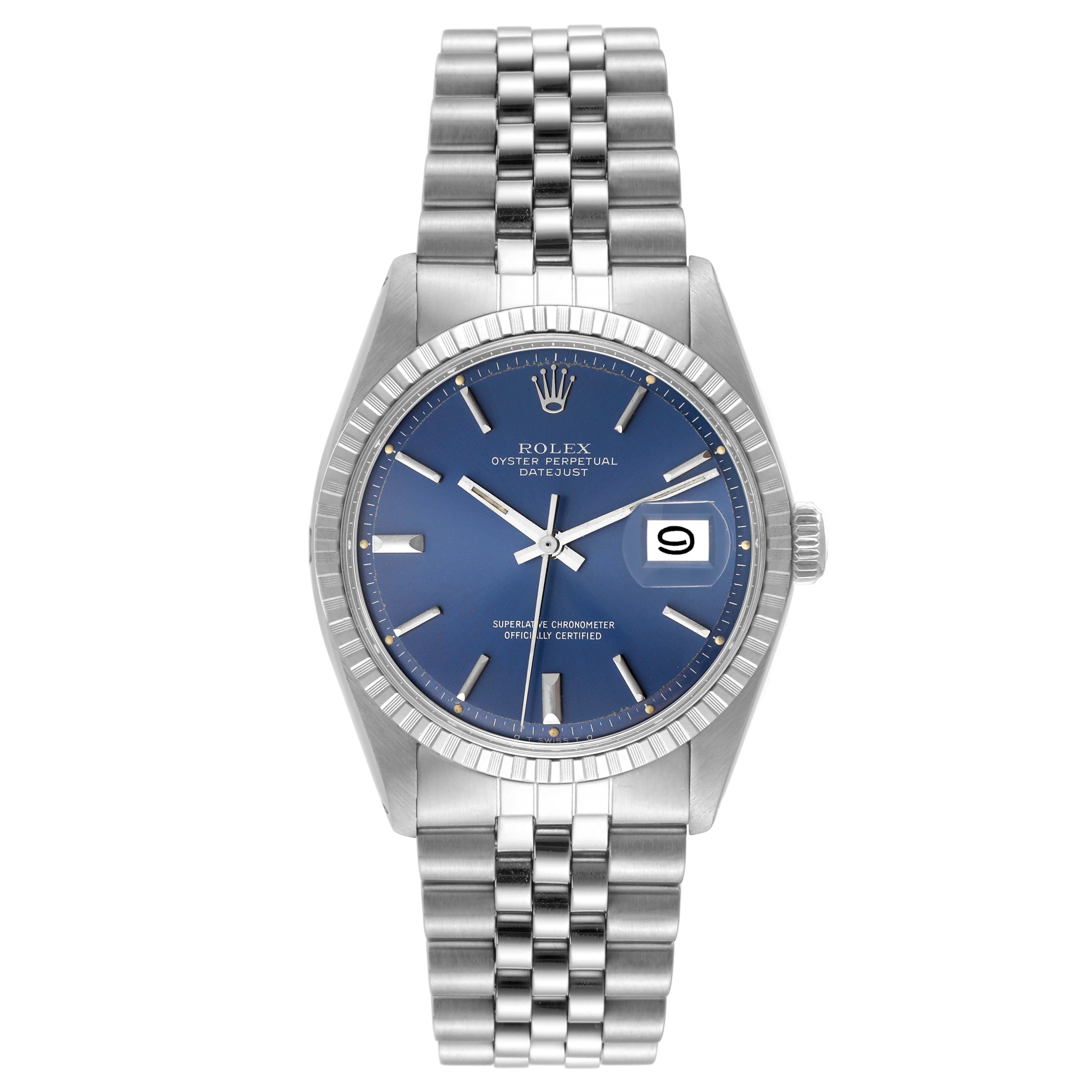 Rolex Datejust Blue Dial Engine Turned Bezel Vintage Steel Mens Watch 1603. Officially certified chronometer automatic self-winding movement. Stainless steel oyster case 36.0 mm in diameter. Rolex logo on the crown. Stainless steel engine turned