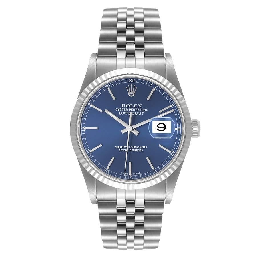 Rolex Datejust Blue Dial Fluted Bezel Steel White Gold Watch 16234. Officially certified chronometer self-winding movement. Stainless steel oyster case 36 mm in diameter. Rolex logo on a crown. 18k white gold fluted bezel. Scratch resistant sapphire