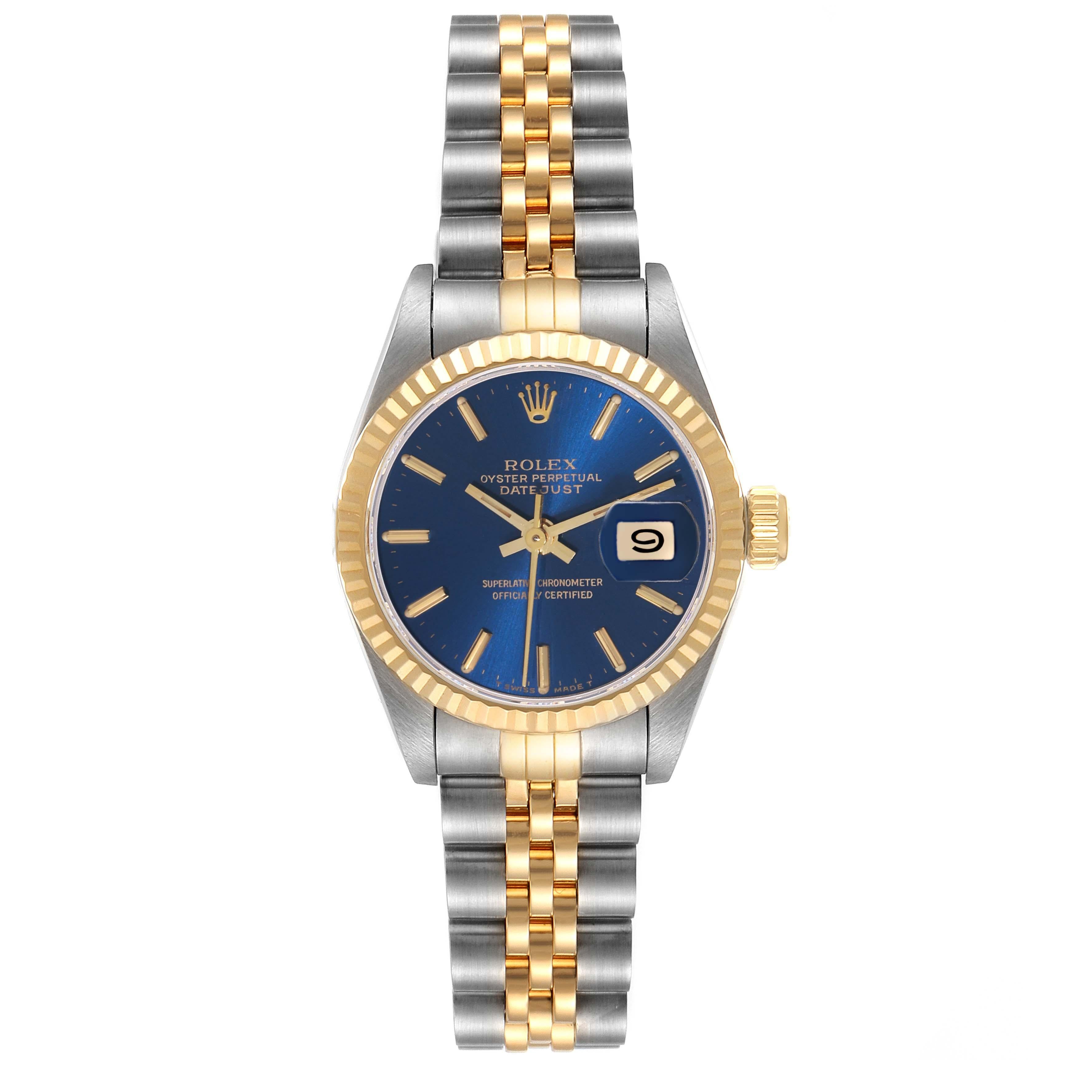 Rolex Datejust Blue Dial Steel Yellow Gold Ladies Watch 69173. Officially certified chronometer automatic self-winding movement. Stainless steel oyster case 26.0 mm in diameter. Rolex logo on the crown. 18k yellow gold fluted bezel. Scratch
