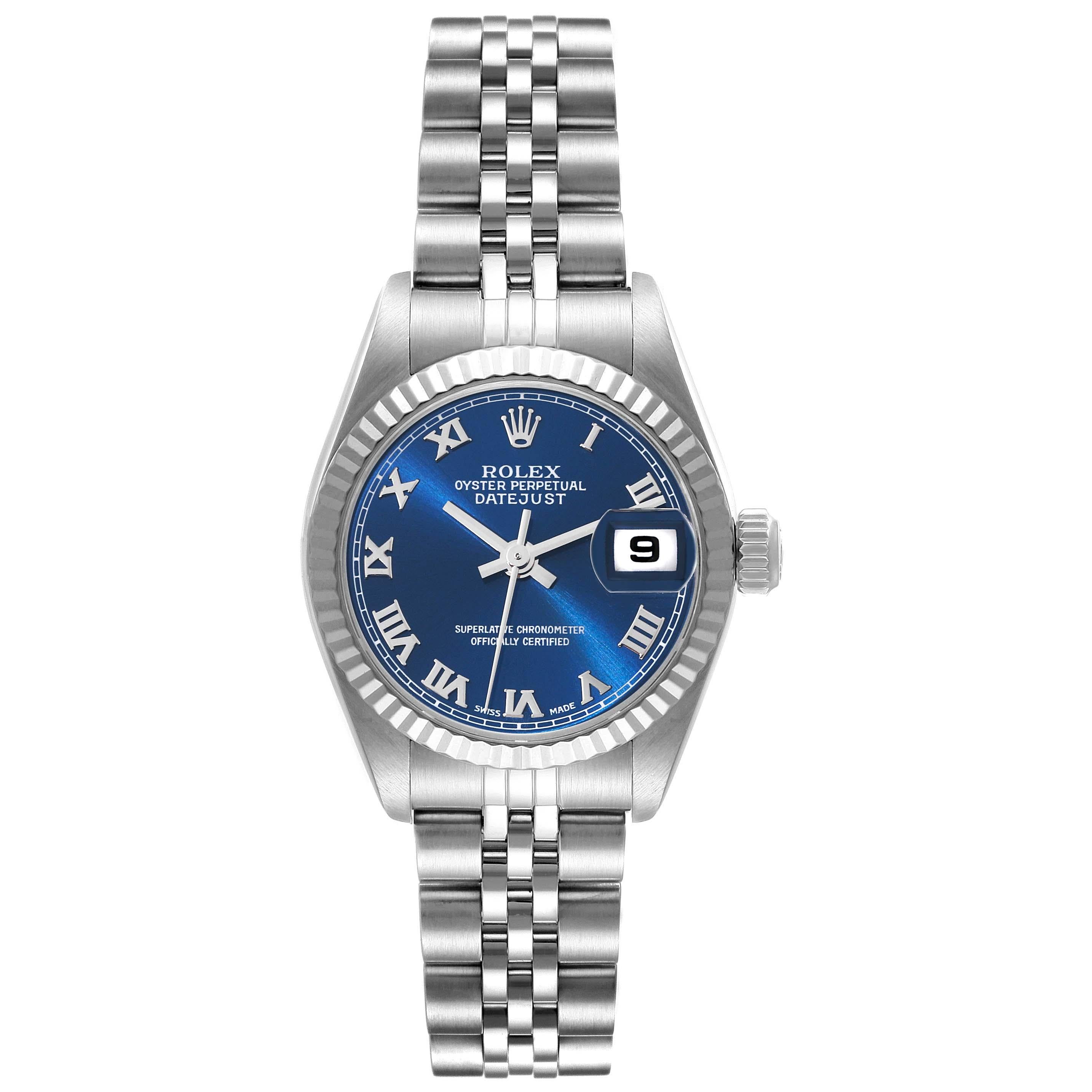 Rolex Datejust Blue Dial White Gold Steel Ladies Watch 79174 Box Papers. Officially certified chronometer automatic self-winding movement. Stainless steel oyster case 26.0 mm in diameter. Rolex logo on the crown. 18k white gold fluted bezel. Scratch
