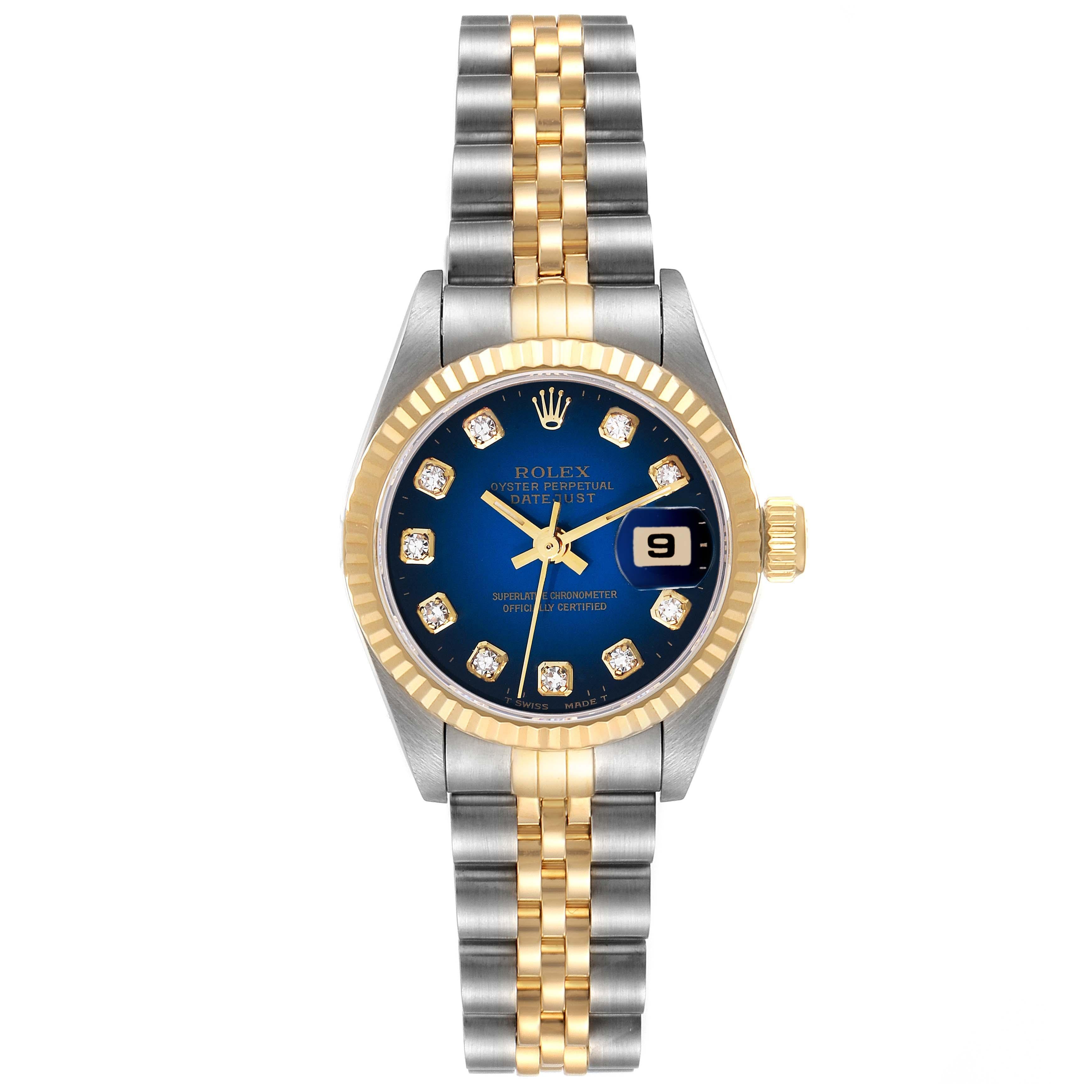 Rolex Datejust Blue Diamond Dial Steel Yellow Gold Ladies Watch 69173. Officially certified chronometer automatic self-winding movement. Stainless steel oyster case 26.0 mm in diameter. Rolex logo on the crown. 18k yellow gold fluted bezel. Scratch