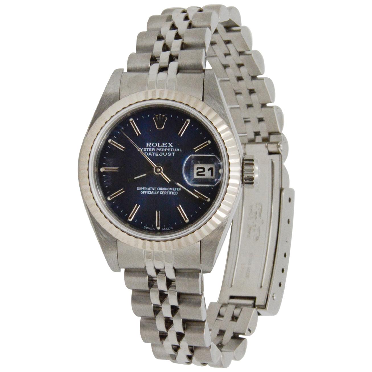 This Circa 2001 CPO Rolex 26mm Datejust Steel has a blue index with a fluted bezel and jubilee bracelet with sapphaire crystal and automatic movement. Model: 79174
