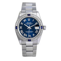 Rolex Montre Datejust bleue à cadran romain, lunette saphir et diamants