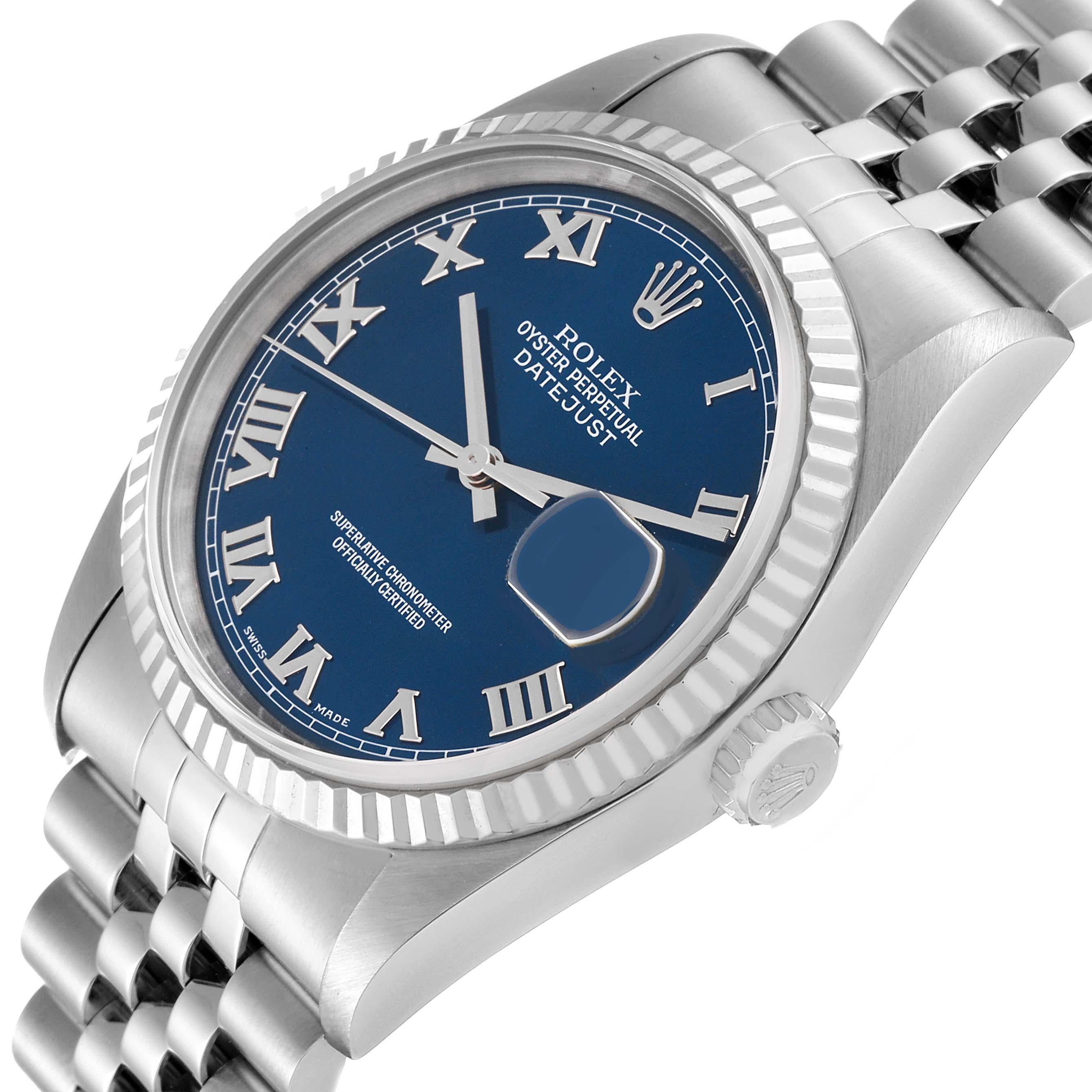 Rolex Datejust Blue Roman Dial Steel White Gold Mens Watch 16234. Officially certified chronometer automatic self-winding movement. Stainless steel oyster case 36 mm in diameter. Rolex logo on the crown. 18k white gold fluted bezel. Scratch