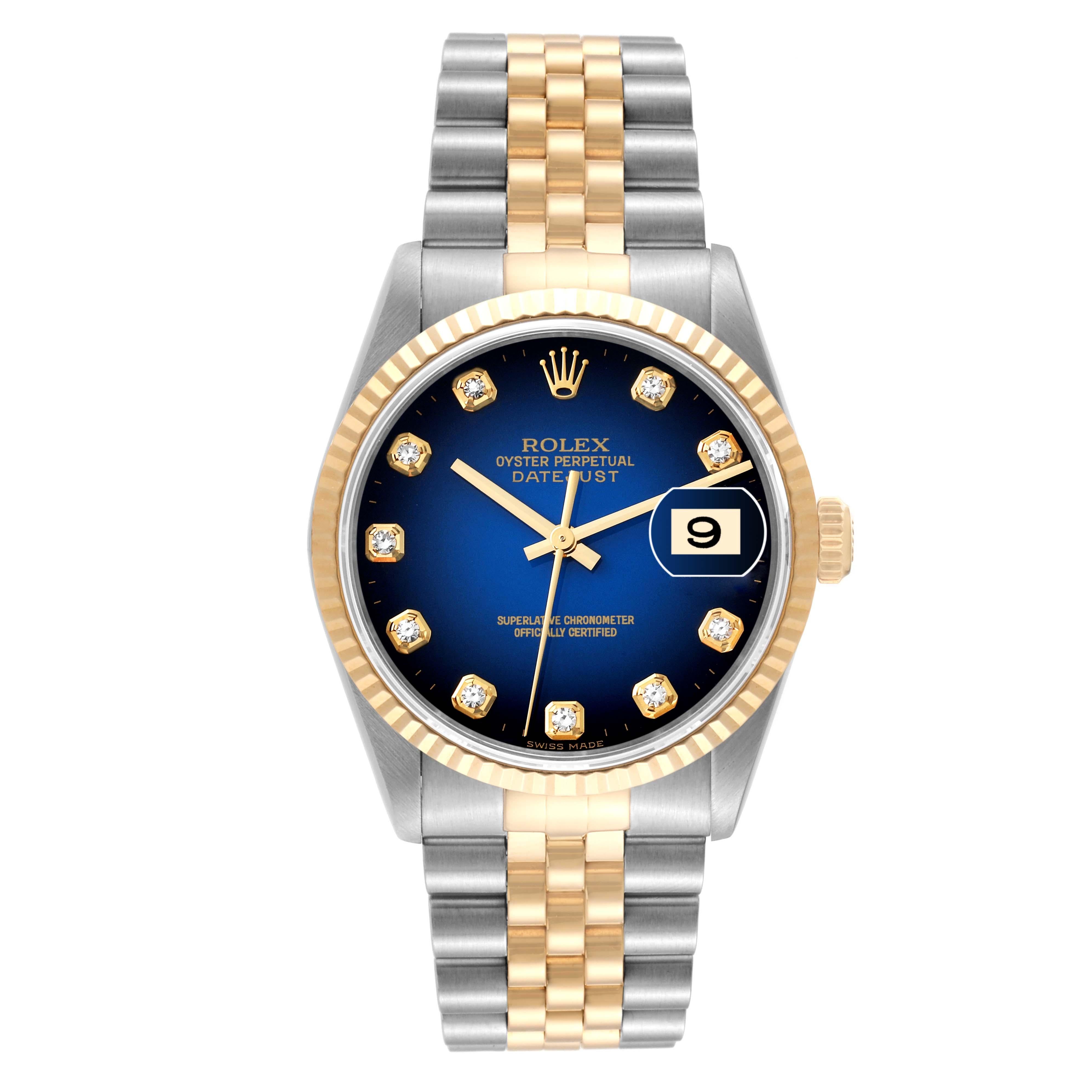 Rolex Datejust Blue Vignette Diamond Dial Steel Yellow Gold Mens Watch 16233. Officially certified chronometer automatic self-winding movement. Stainless steel case 36.0 mm in diameter.  Rolex logo on an 18K yellow gold crown. 18k yellow gold fluted