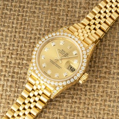Rolex Datejust Cadran Champagne Lunette Diamant 26mm 79158
