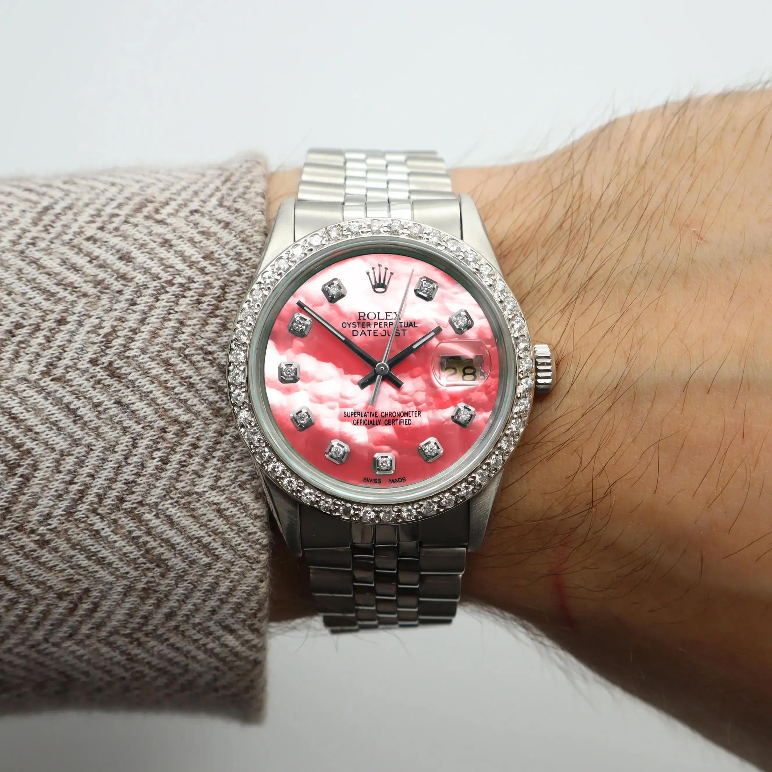 1 Cttw Custom Diamond Bezel and 0.20 Custom Diamond Pink Dial. 

General Information:
Brand: Rolex
Model: Rolex Datejust 16014
Model Number: 16014
Type: Wristwatch
Department: Men
Country/Region of Manufacture: Switzerland
Vintage: Yes
Customized:
