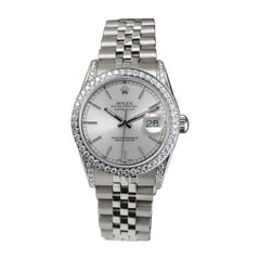 Rolex Datejust Bisel de Diamantes y Tapones Esfera Indice Plateada Reloj de Acero