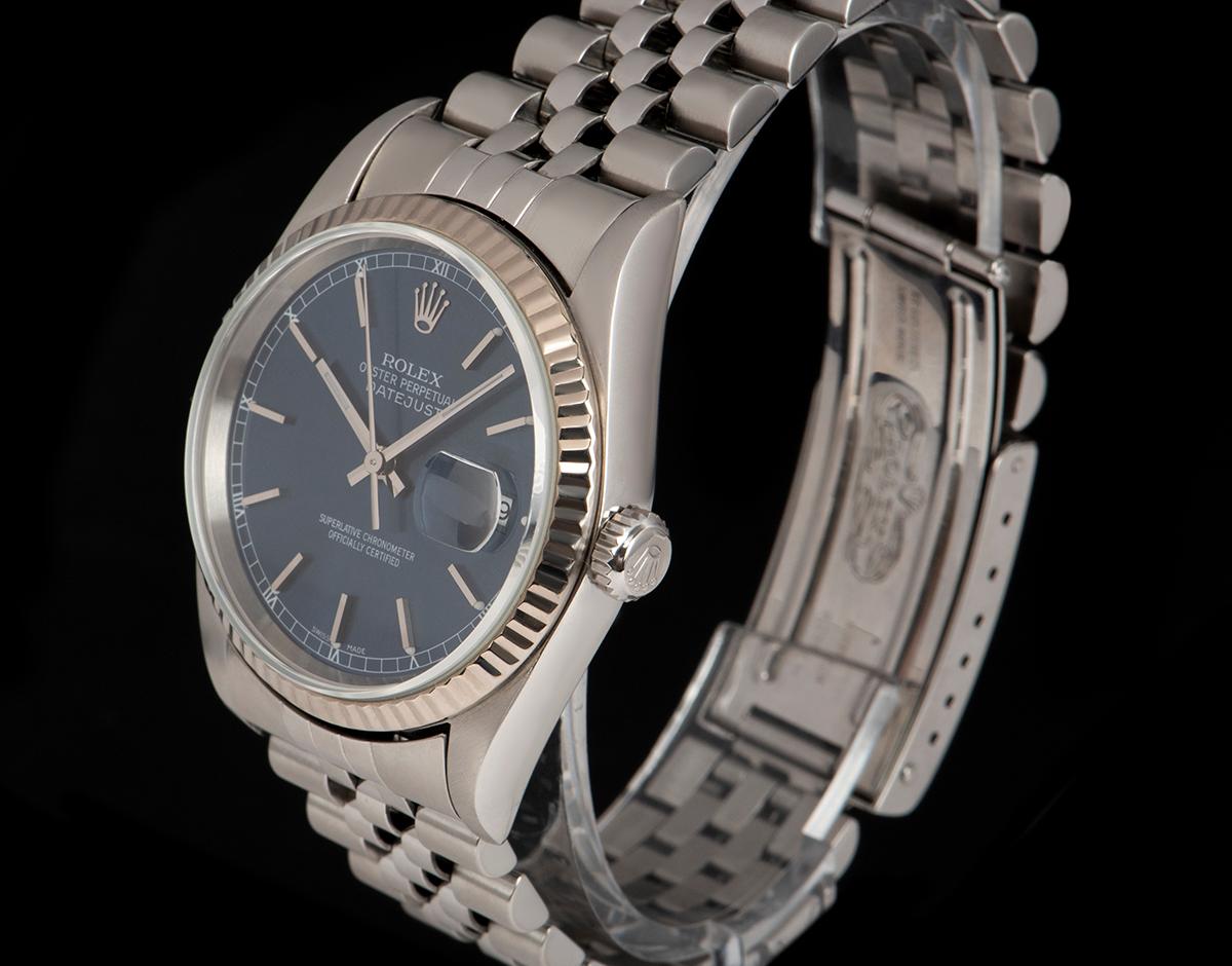 A Stainless Steel Oyster Perpetual Datejust Gents Wristwatch, blue dial with applied hour markers, date at 3 0'clock, a fixed 18k white gold fluted bezel, a stainless steel jubilee bracelet with a stainless steel deployant clasp, sapphire glass,