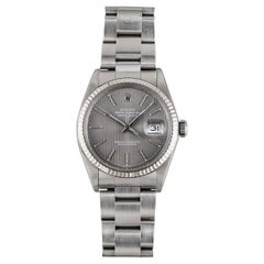 Montre Rolex Datejust à tapisserie grise en or blanc, années 1980