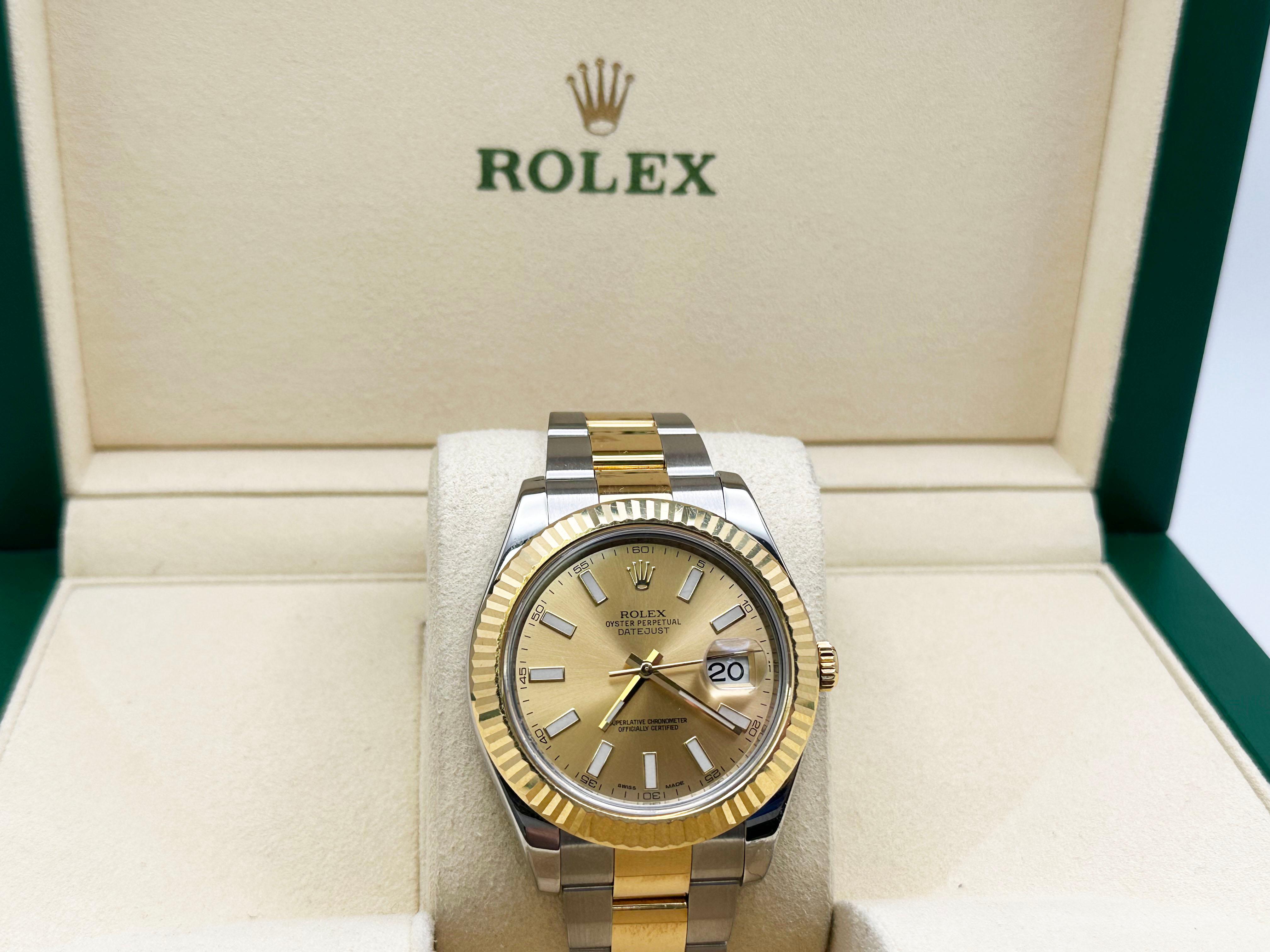 Style Number: 116333

 

Serial: G159***

 

Model: Rolex Datejust II

 

Case Material: Stainless Steel

 

Band: 18K Yellow Gold & Stainless Steel

 

Bezel: 18K Yellow Gold

 

Dial: Champagne

 

Face: Sapphire Crystal

 

Case Size: 41mm

