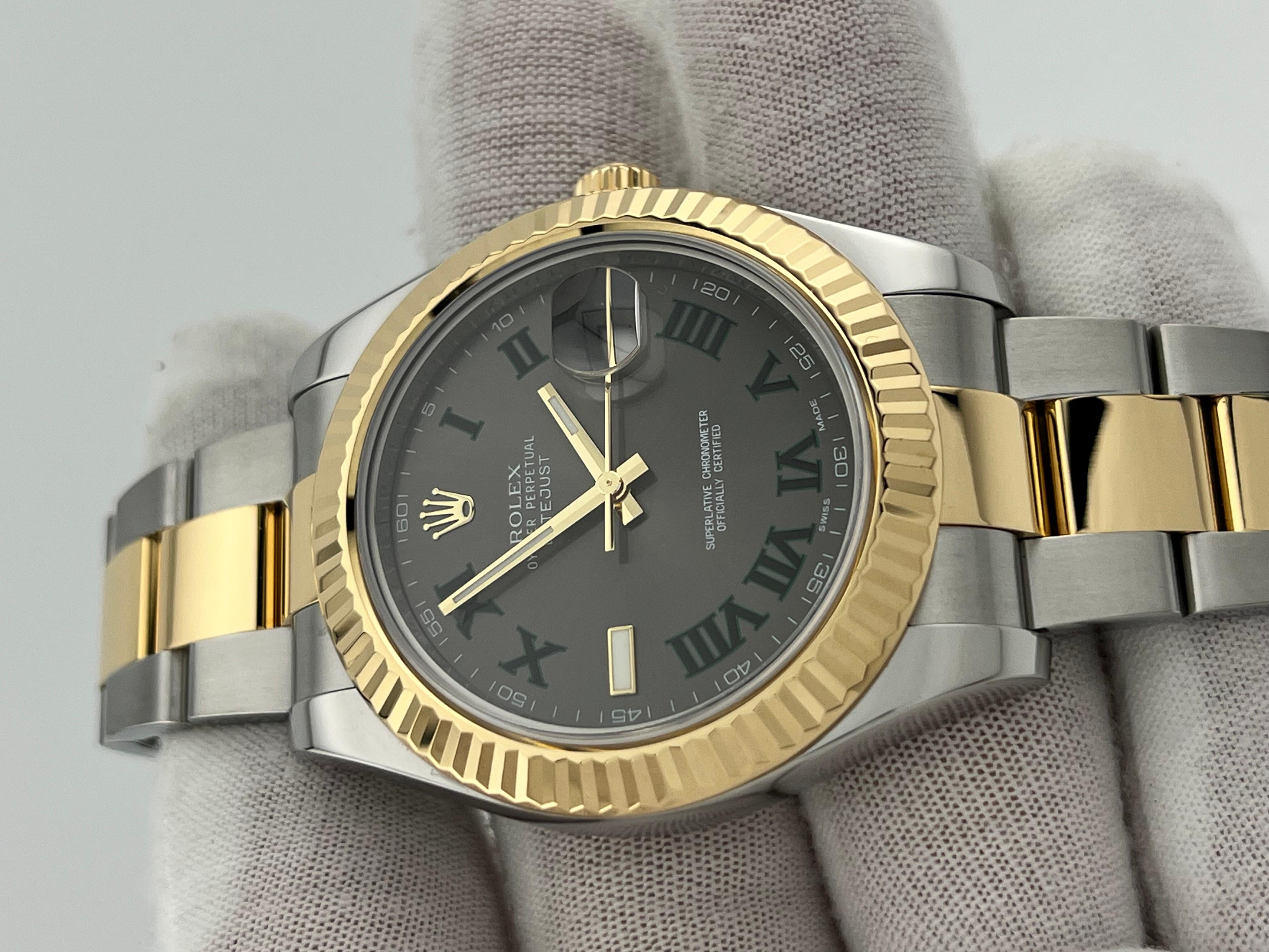 Style Number: 116333



Serial: G036***



Year: 2010

 

Model: Rolex Datejust II

 

Case Material: Stainless Steel 

 

Band: 18K Yellow Gold & Stainless Steel 

 

Bezel: 18K Yellow Gold Fluted Bezel 

 

Dial: Slate Wimbledon Dial

 

Face:
