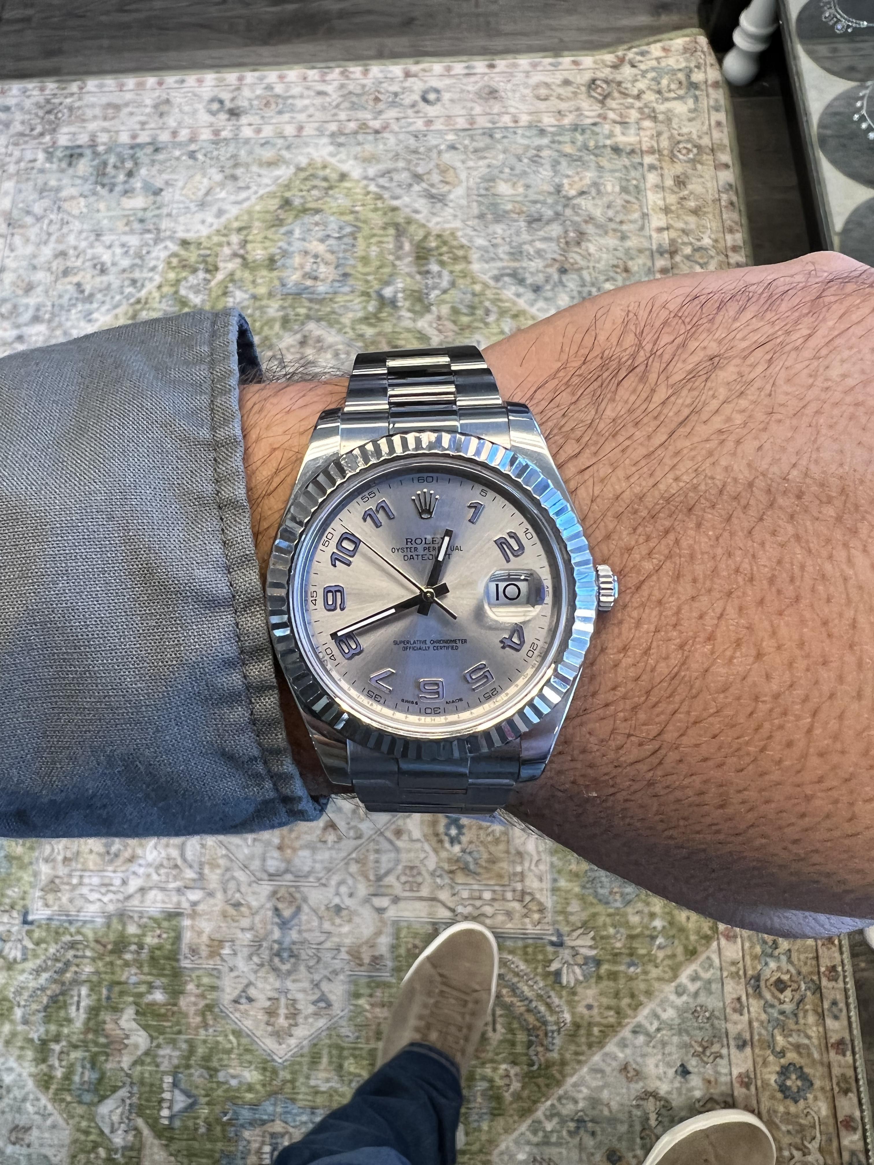 BRAND: Rolex
MODEL: Datejust II
REFRENCE: 116334
SIZE: 41mm
CASE: Stainless Steel
DIAL: Silver Purple numbers
BEZEL: White Gold
BAND: Oyster Stainless Steel
MOVEMENT: Automatic

Very good condition, very slight bracelet stretch
Box &