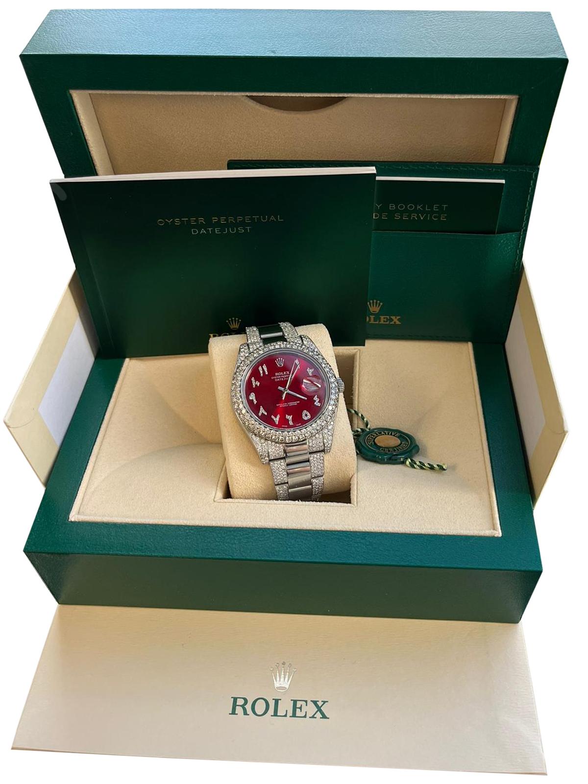 The Rolex 116334 Datejust II 41mm with Aftermarket Diamond Red Arabic Dial Watch is a striking timepiece with elegance and sophistication. With its 2.5ctw Aftermarket diamond bezel and captivating Red Arabic dial with Aftermarket Diamond Bracelet,
