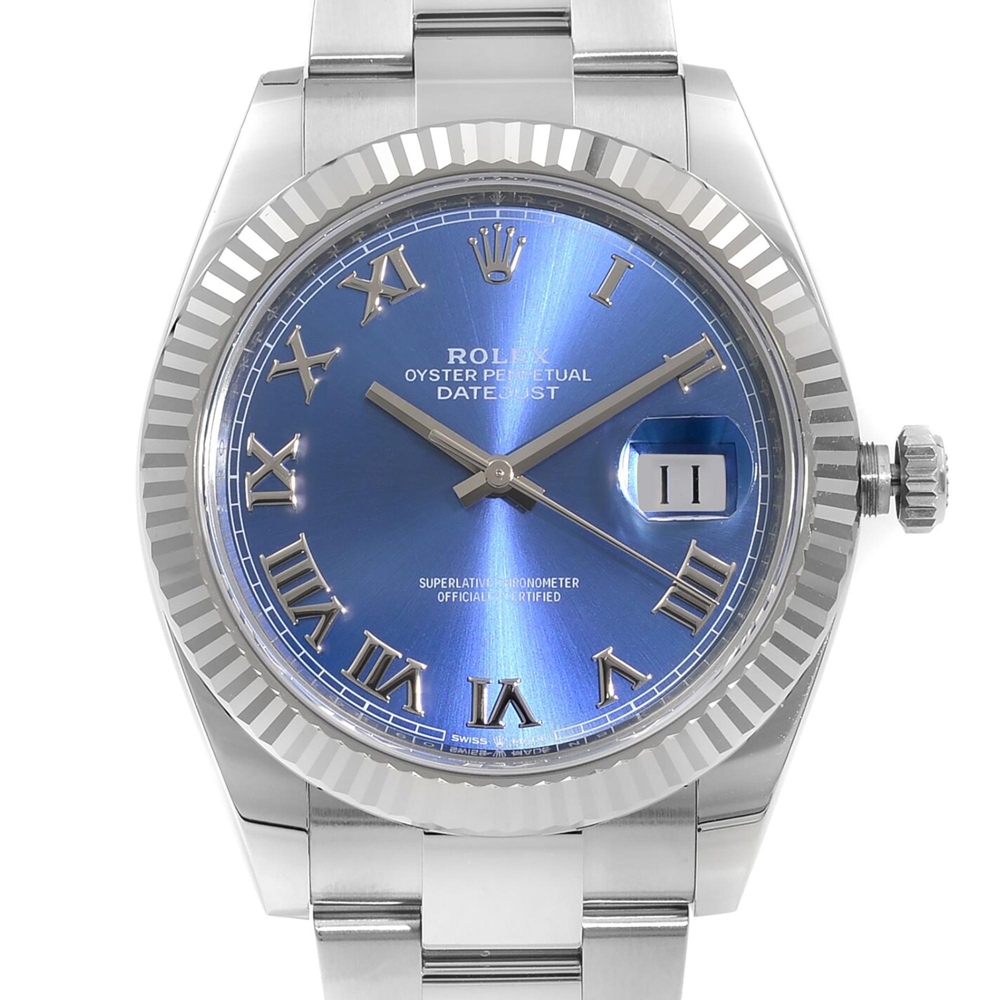 Pre-owned Rolex Datejust 41 Steel 18k White Gold Blue Dial Automatic Mens Watch. This Beautiful Timepiece Features: Stainless Steel Case with a Stainless Steel Rolex Oyster Bracelet, Fixed Fluted 18kt White Gold Bezel, Blue Dial with Silver-Tone