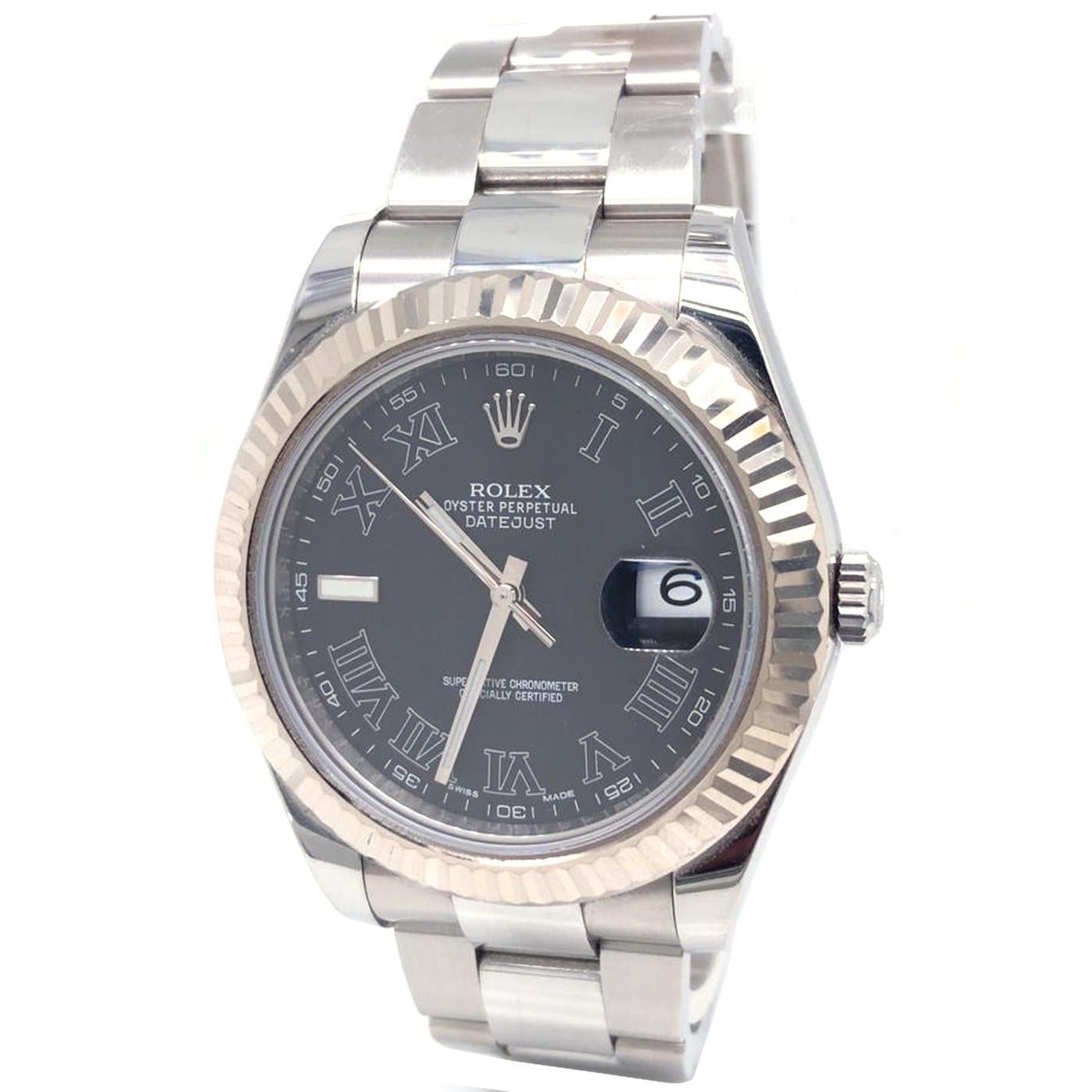 Rolex Datejust II in stainless steel Ref# 116334 the Year 2015. On the original stainless steel Oyster bracelet with a stainless steel deployment clasp. Fluted 18k white gold bezel with a sapphire crystal. Rehaut engraved with the serial number. The