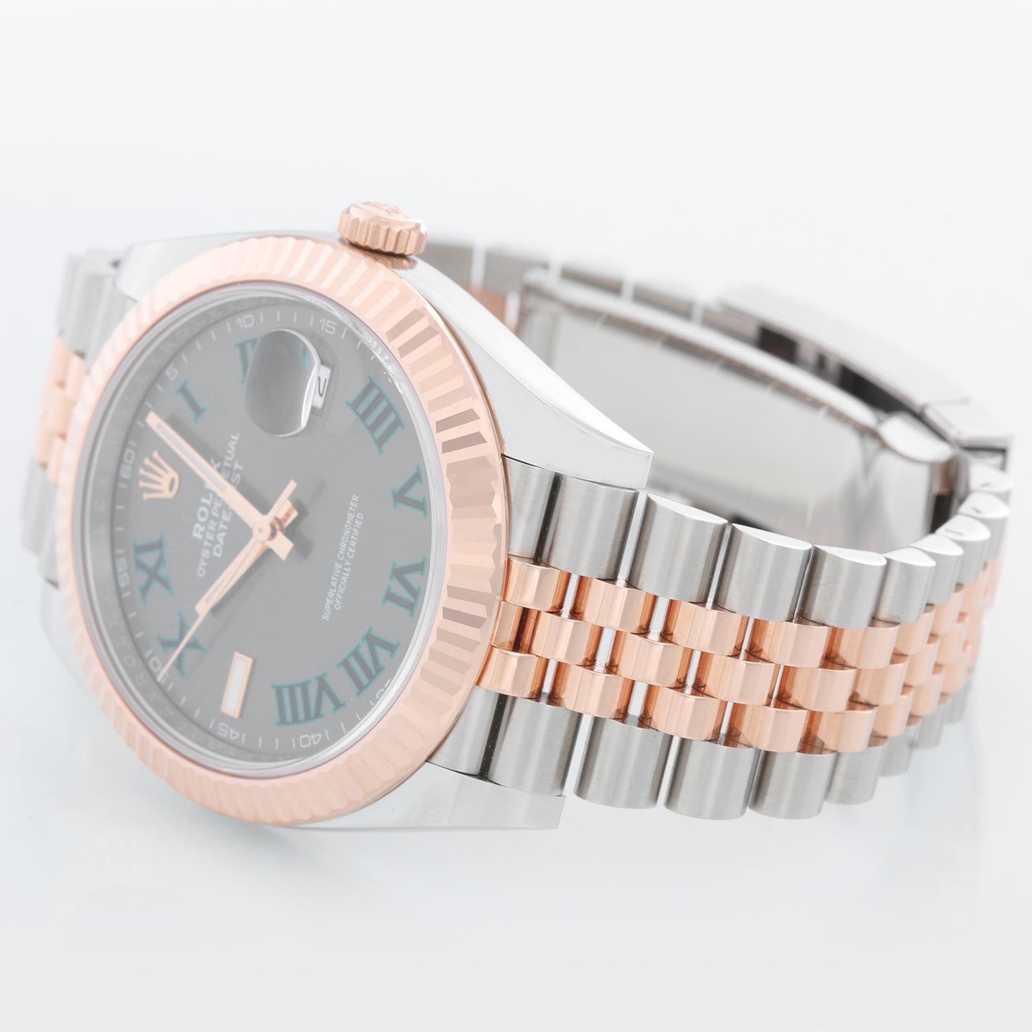 Rolex Datejust II  Men's 2-Tone Steel & Rose Gold 41mm Watch 126331 - Automatic winding, Quickset, sapphire crystal. Stainless steel case with 18k rose gold fluted bezel  (41mm diameter). Grey dial with green Roman  numerals; Wimbledon dial.