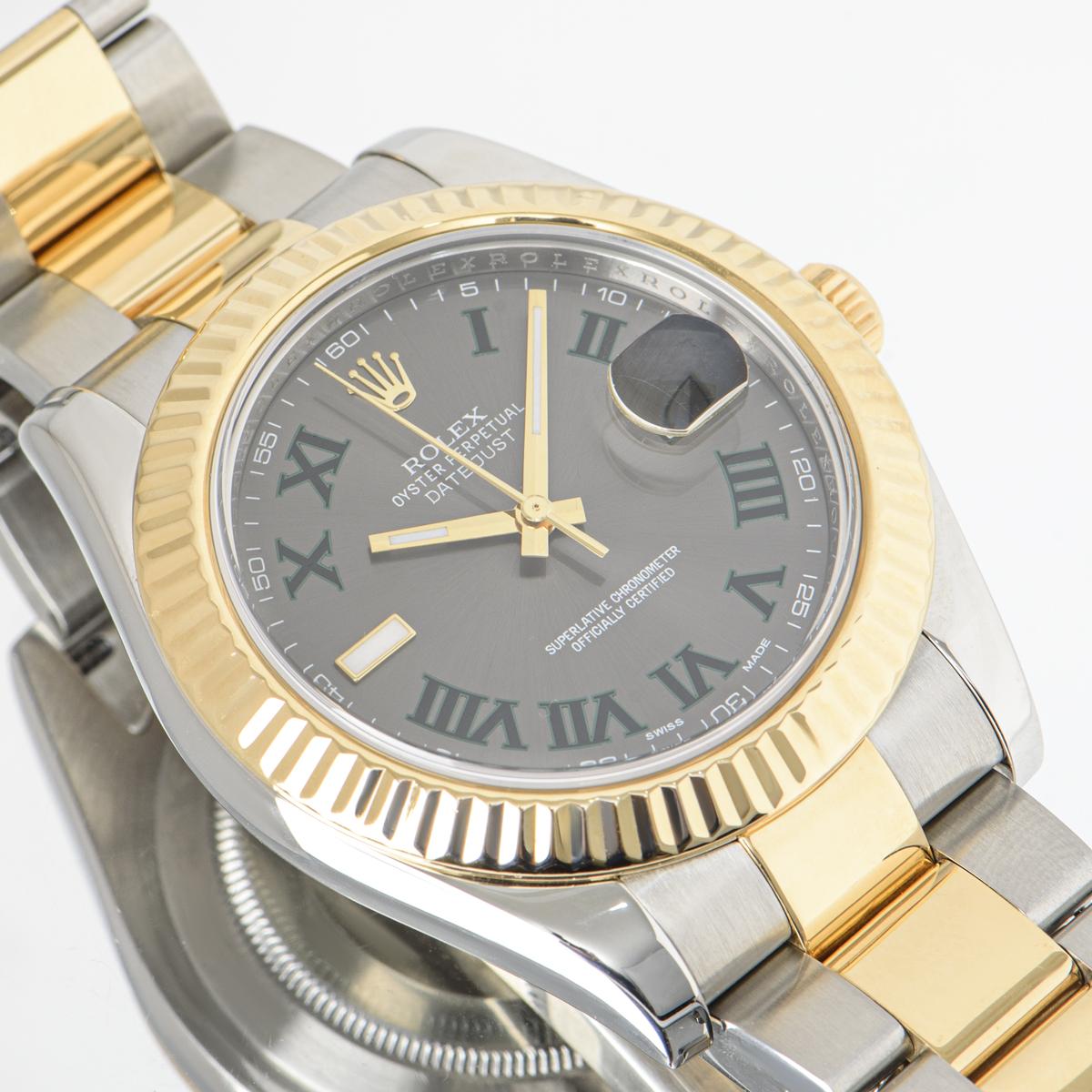 A 41mm Datejust II in Oyster steel and yellow gold by Rolex, featuring a Wimbledon dial and a fluted yellow gold bezel. The Oyster bracelet comes with a folding Oyster clasp. Fitted with scratch-resistant sapphire crystal and a self-winding